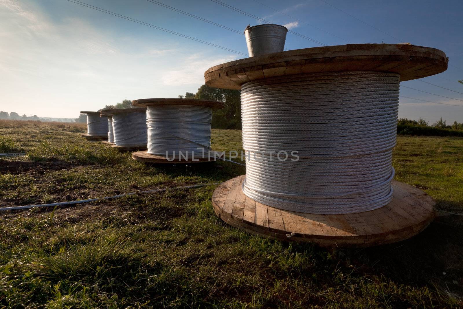 Bobbins with electric power wire by igor_stramyk