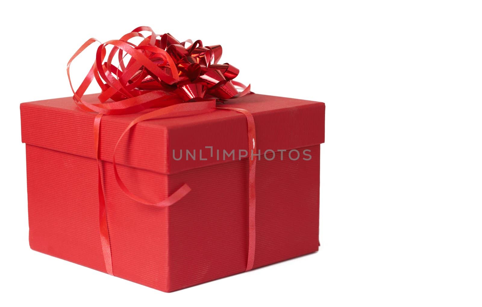 Red gift box with bow isolated on white background with copy space