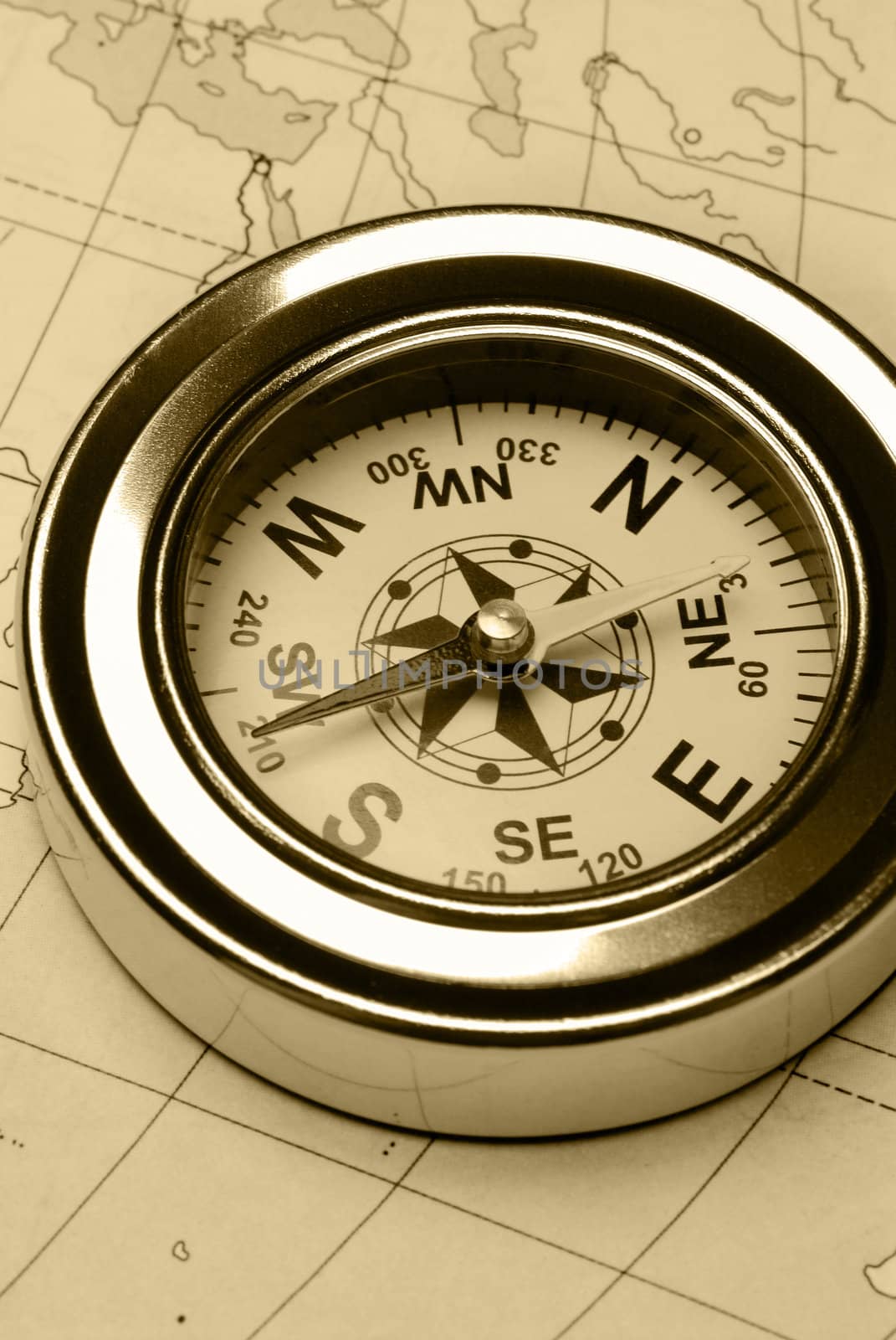 Ancient compass. The old device for the instruction of a direction and an old card