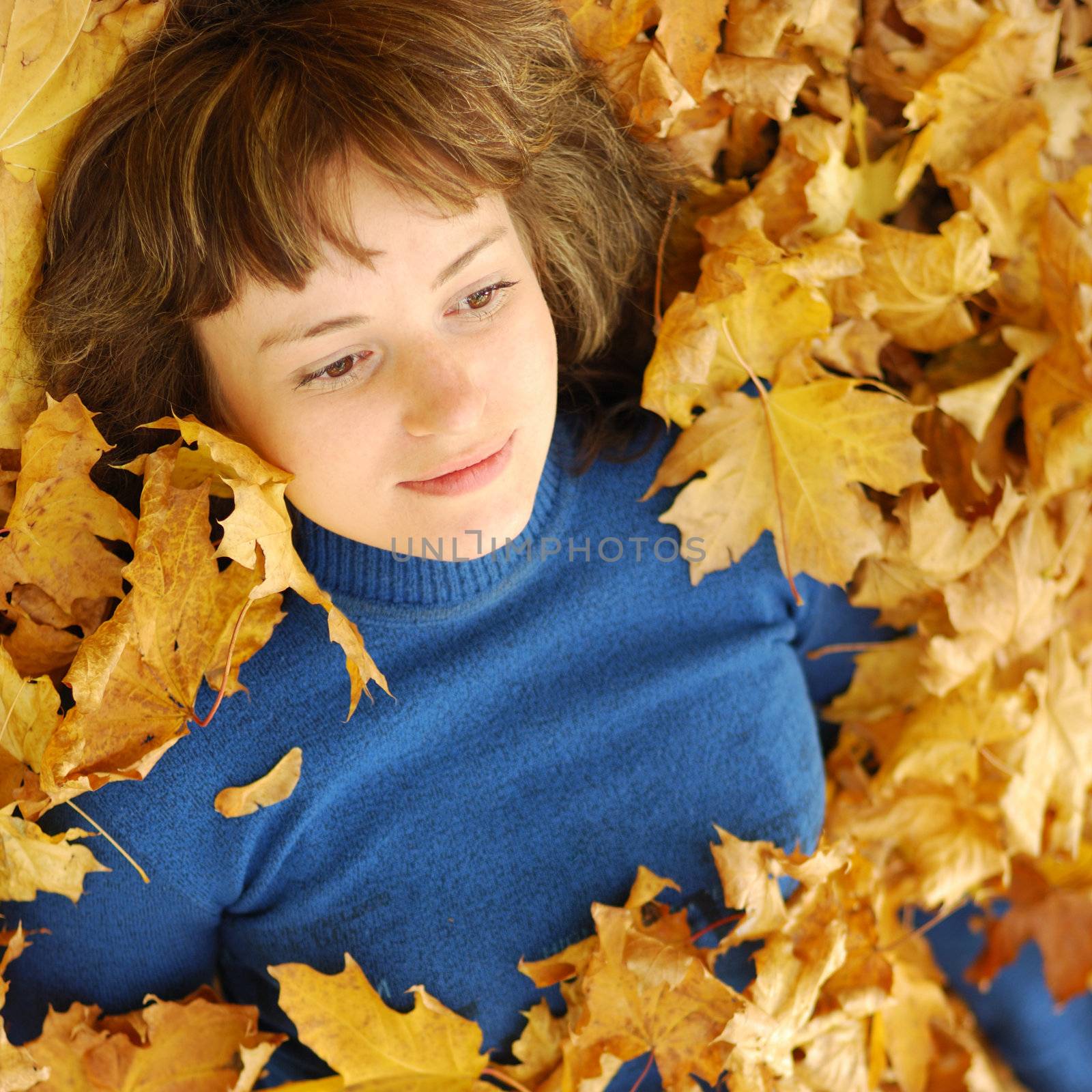 The girl and autumn leaves. A season - autumn, age of 26 years