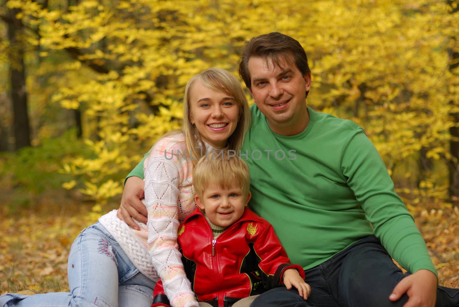 Family in autumn forest by galdzer