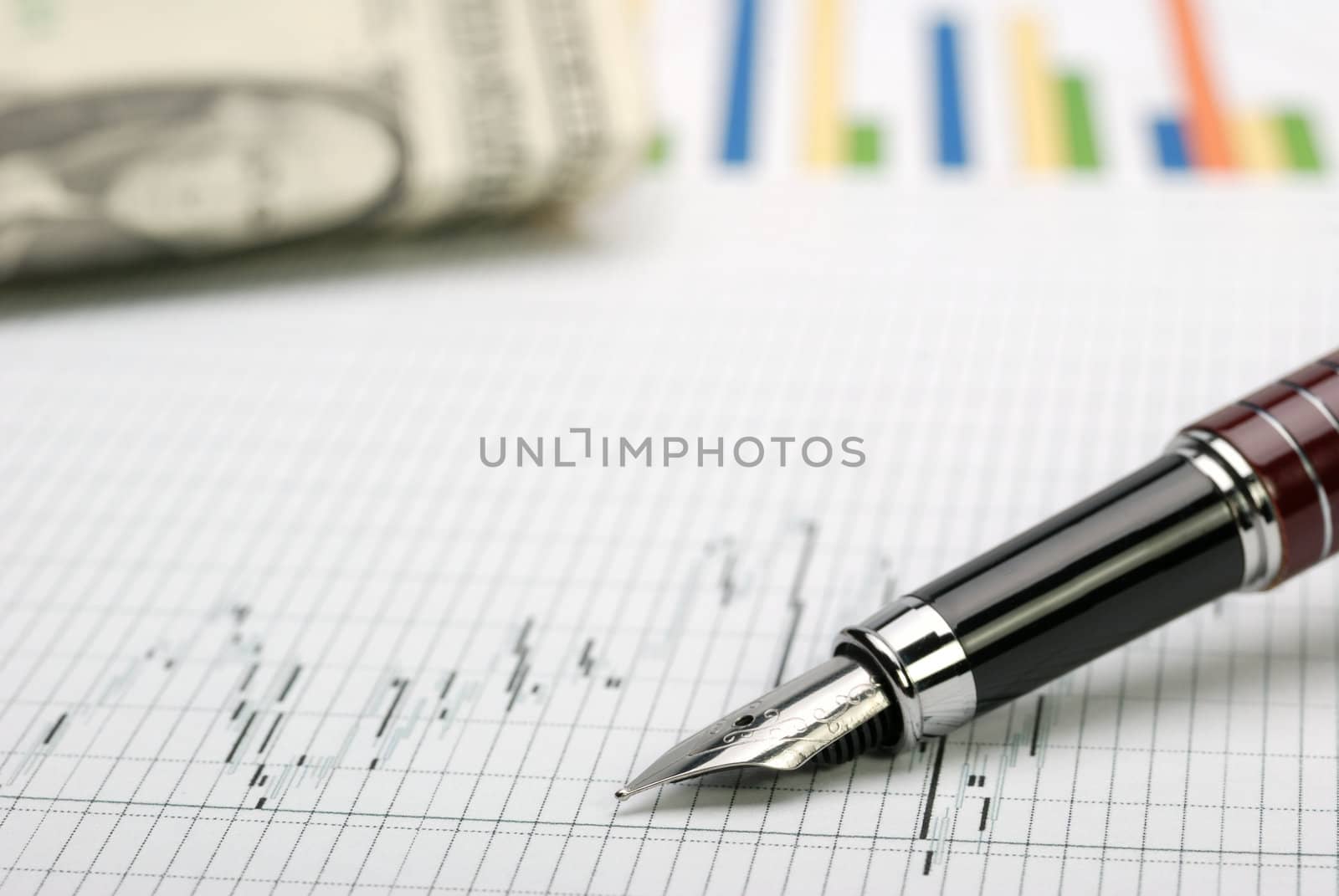 Business a theme. Diagrams from the share market, pens. Concept - exchange activity