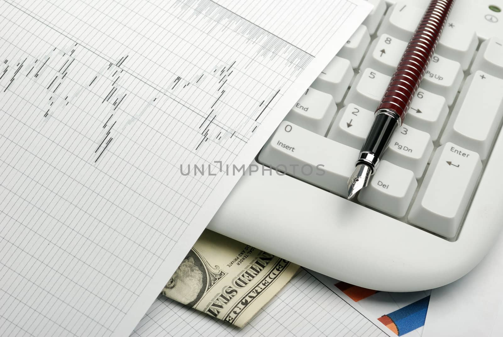 Business a theme. Diagrams from the share market, pens. Concept - exchange activity
