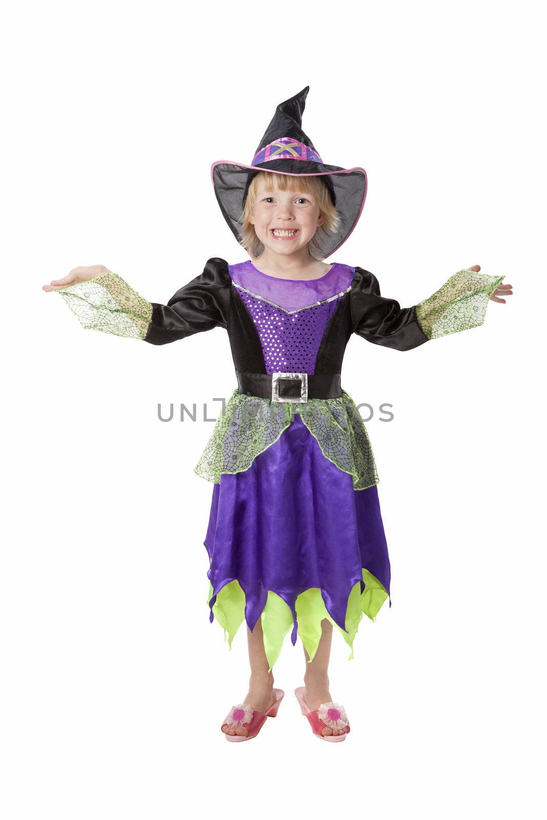 Little girl dressed like a pretty witch