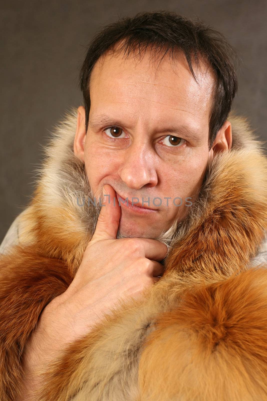Portrait of the man in the fox fur coat