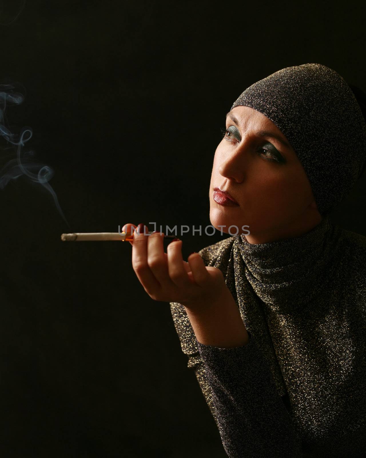 Lady with a cigarette on black background