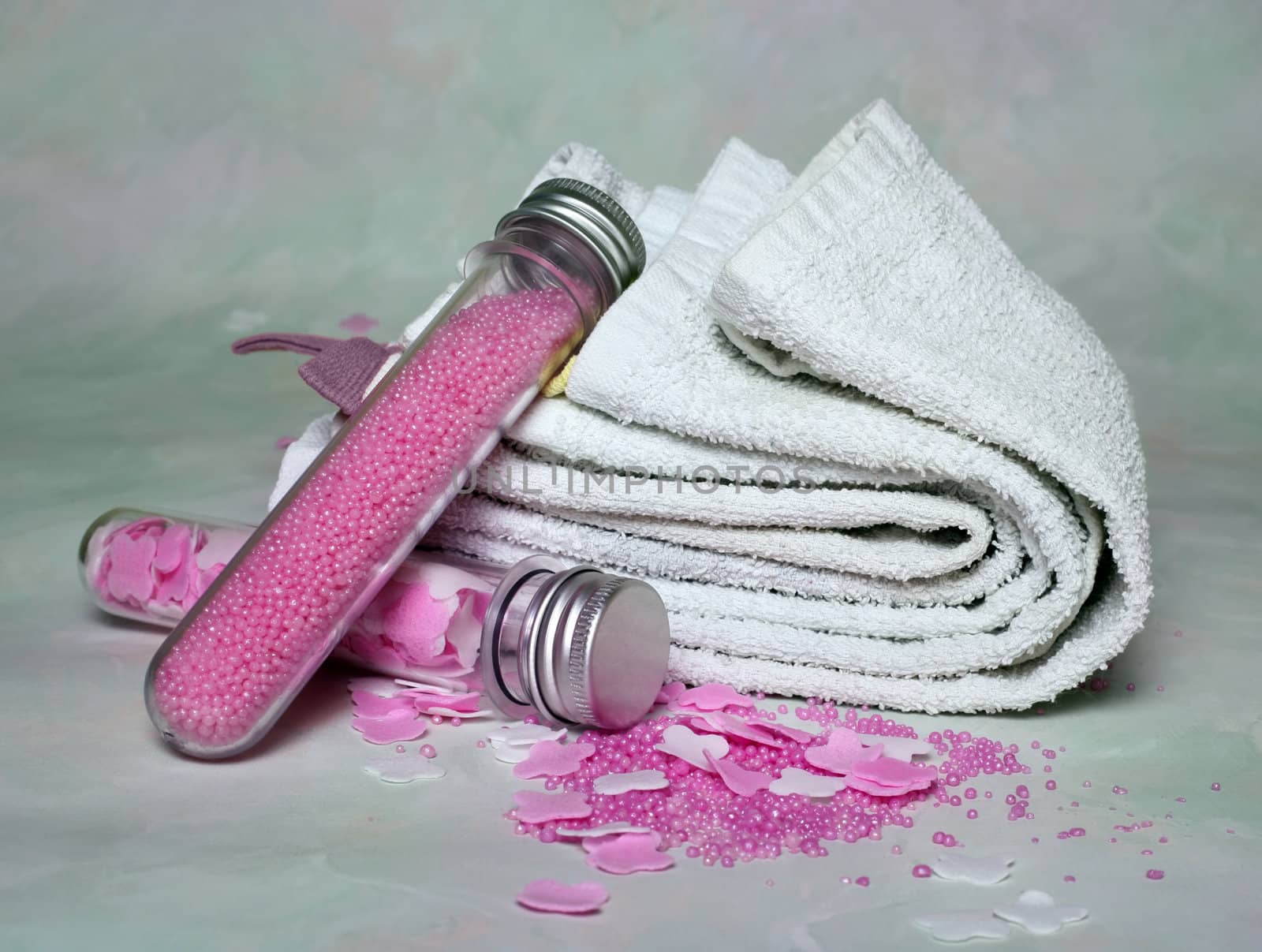 Bottles with pink salt for baths