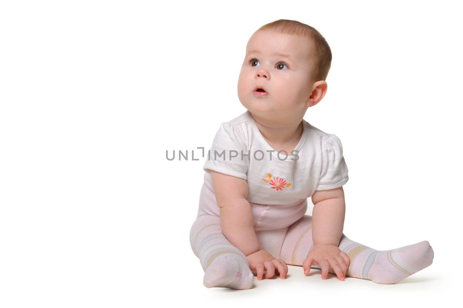 The baby. Age of 8 months. It is isolated on a white background