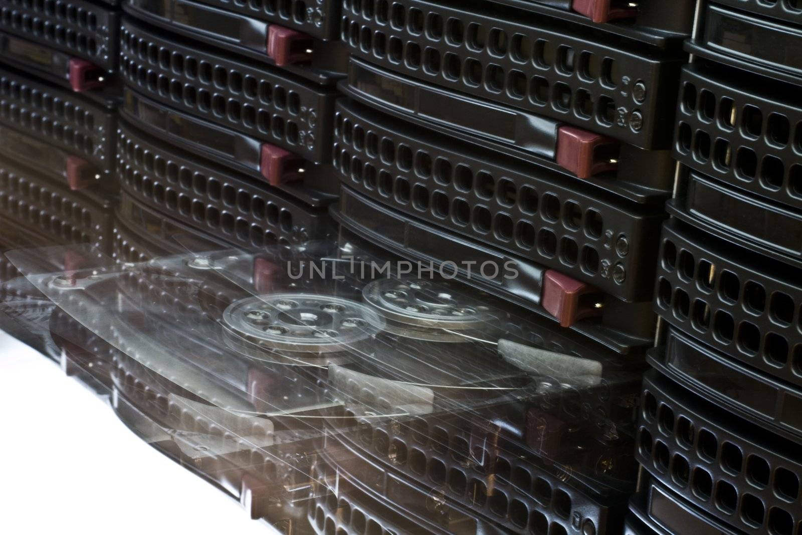 Open Hard Disk Drive in black hot swap frame. Nice reflection on platter.