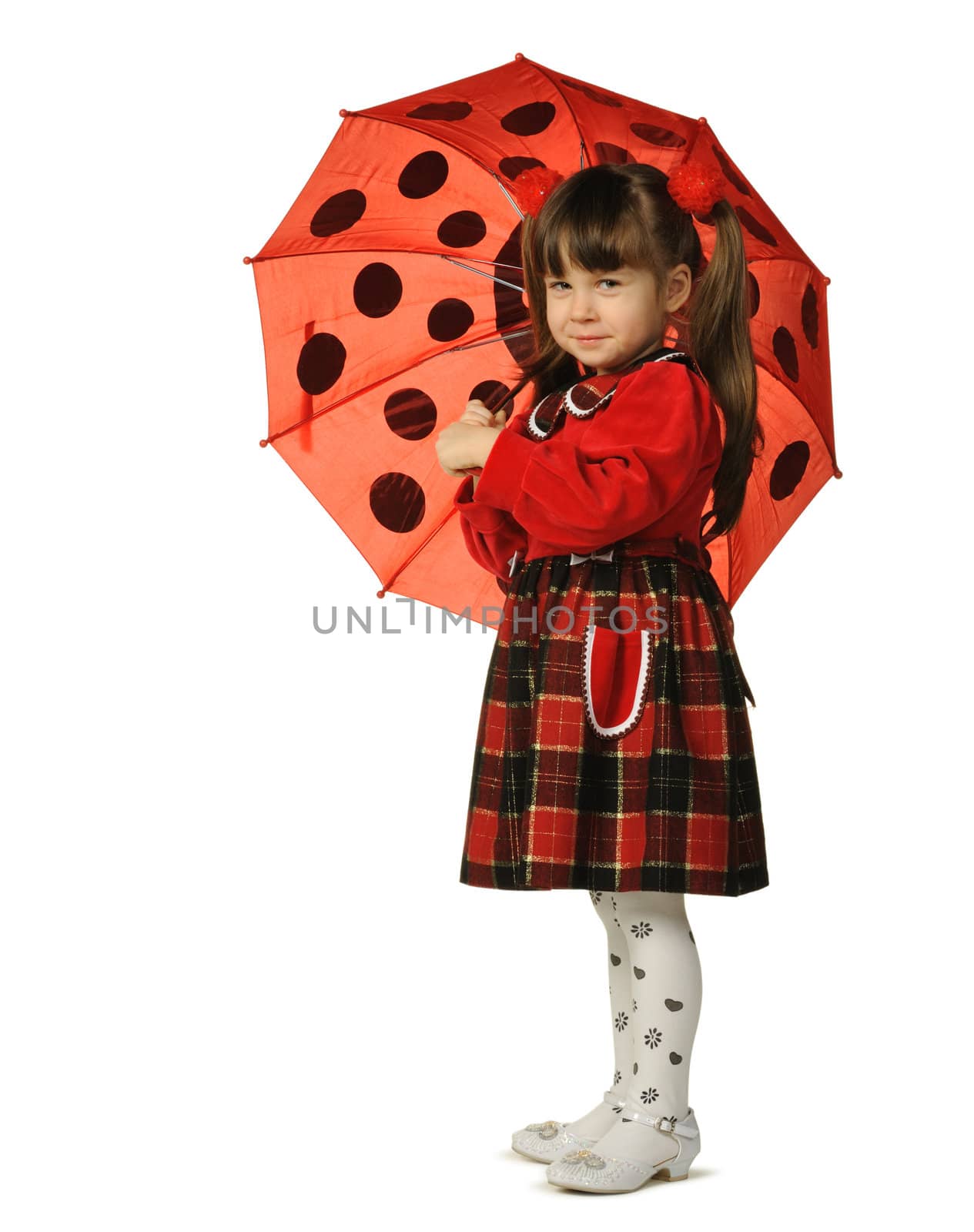 The little girl with a umbrella. It is isolated on a white background