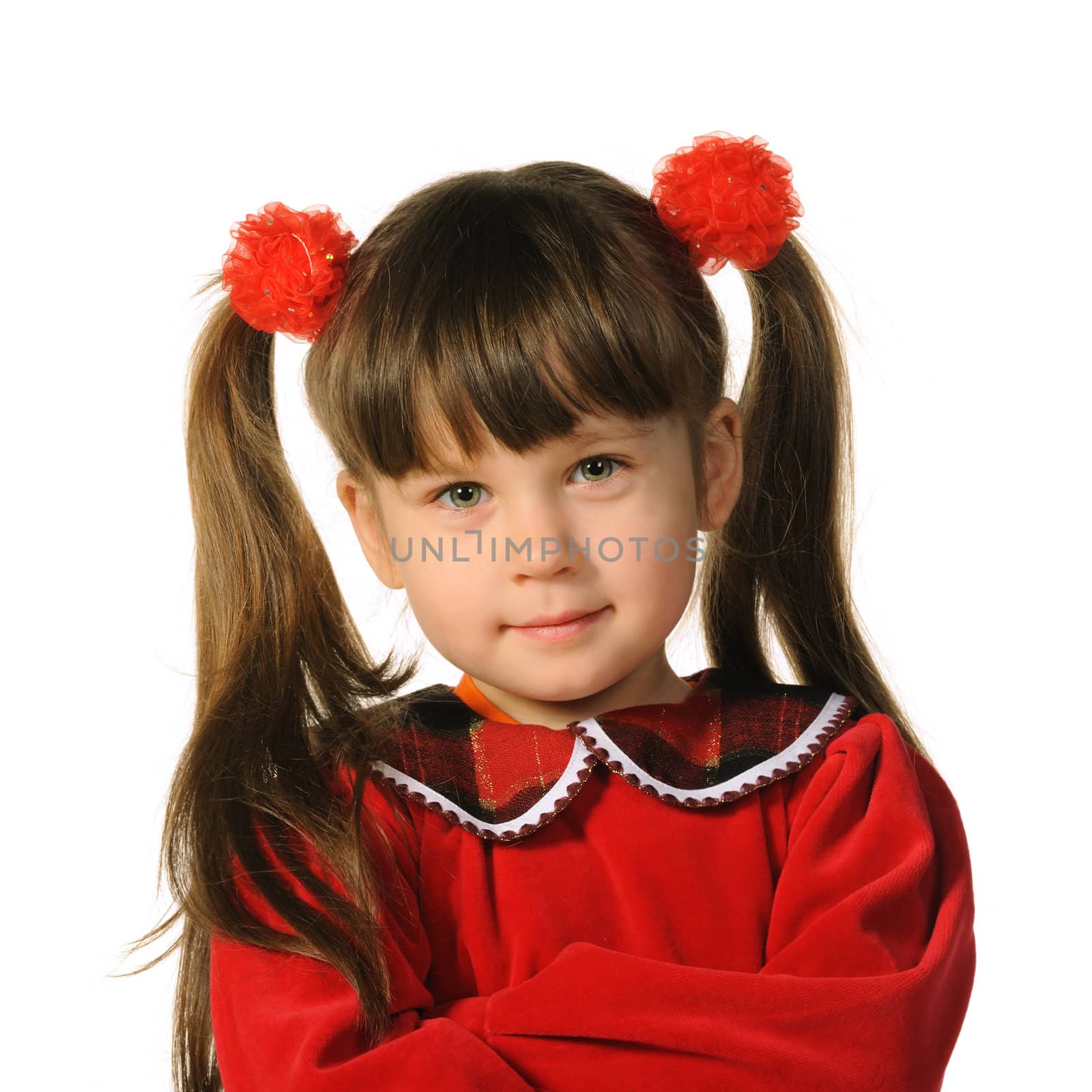 Portrait of the pretty little girl. It is isolated on a white background