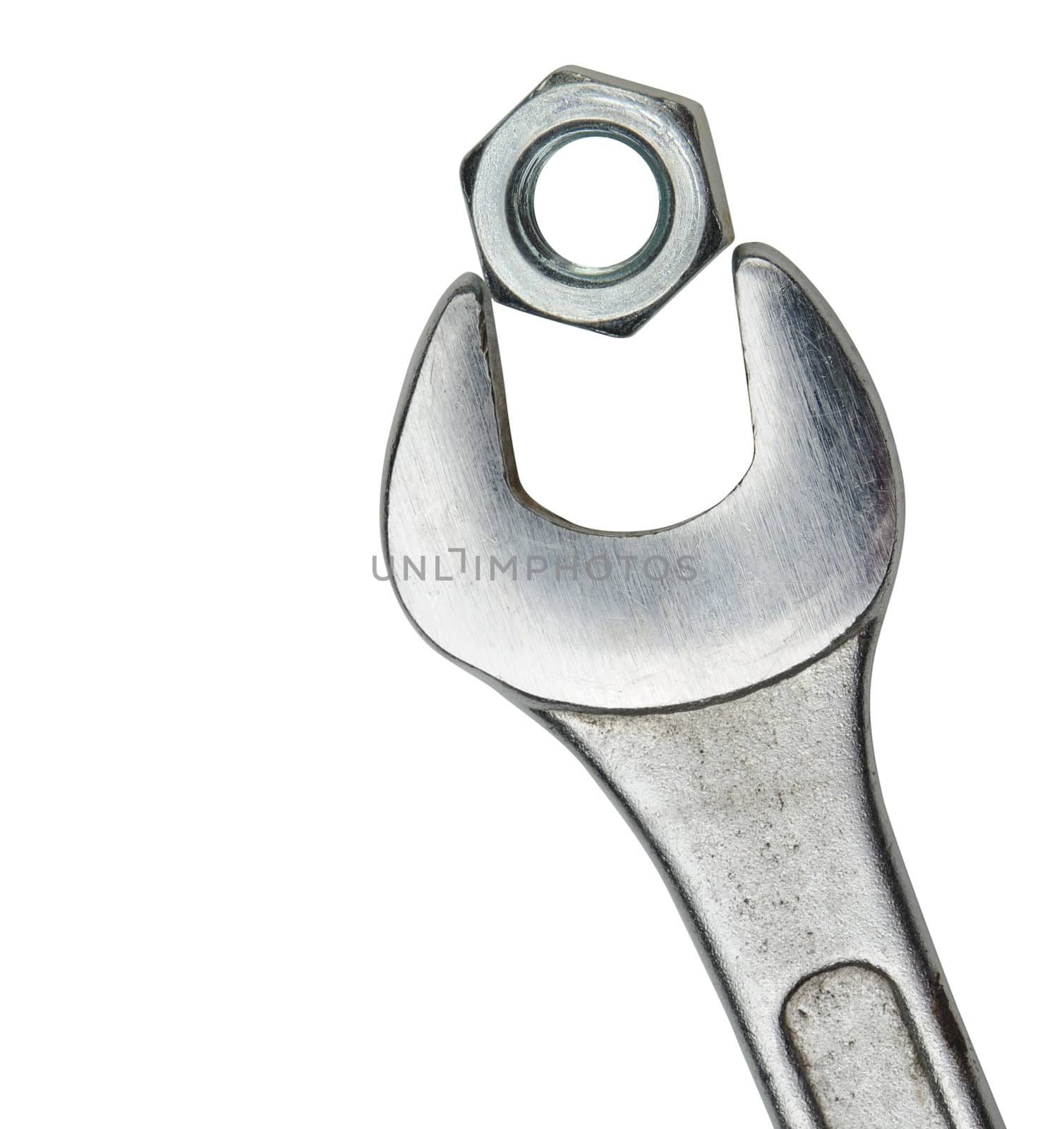 Wrench with a nut. It is isolated on a white background