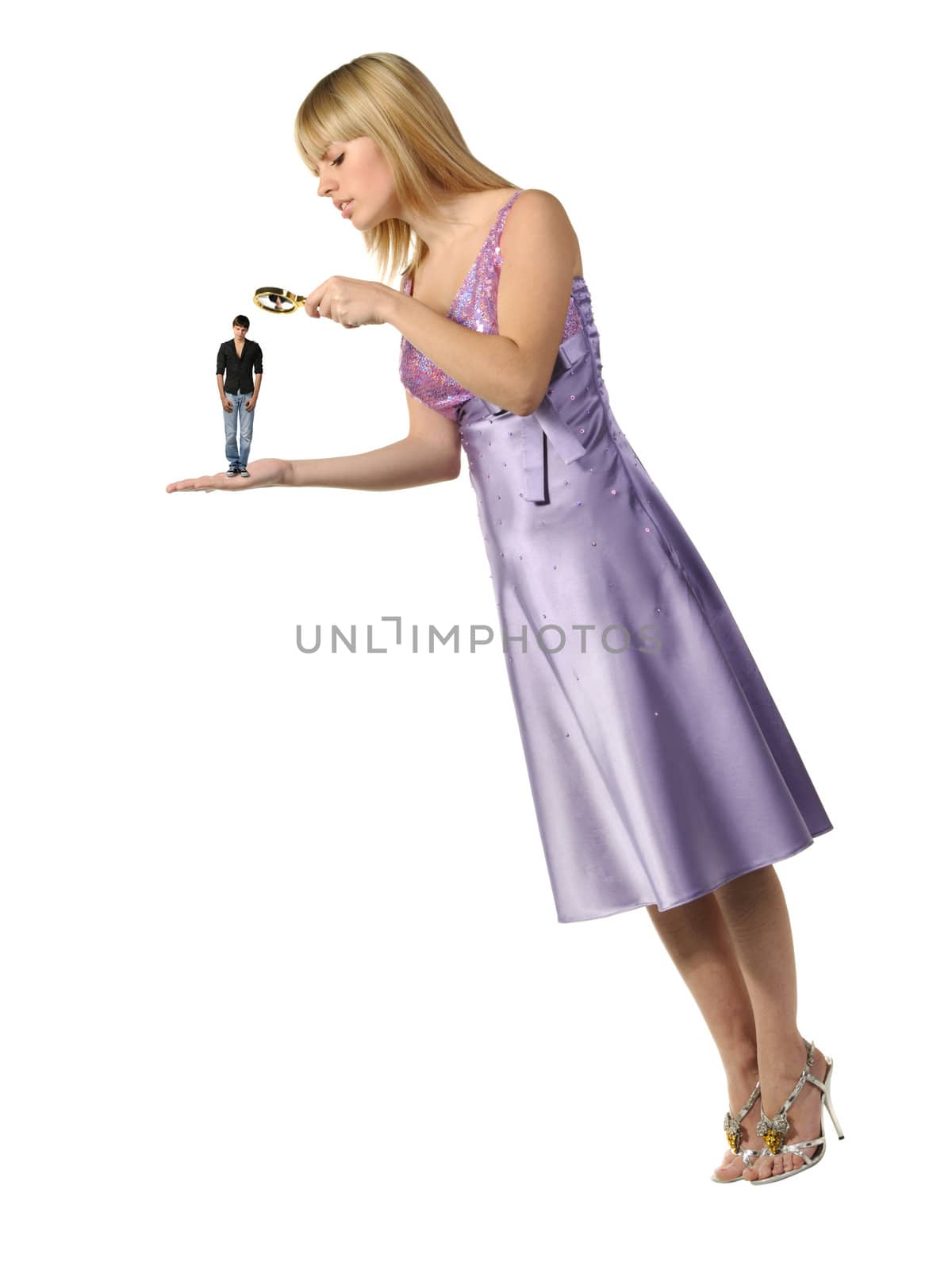 The girl considering the guy through a magnifier. The potential groom.It is isolated on a white background