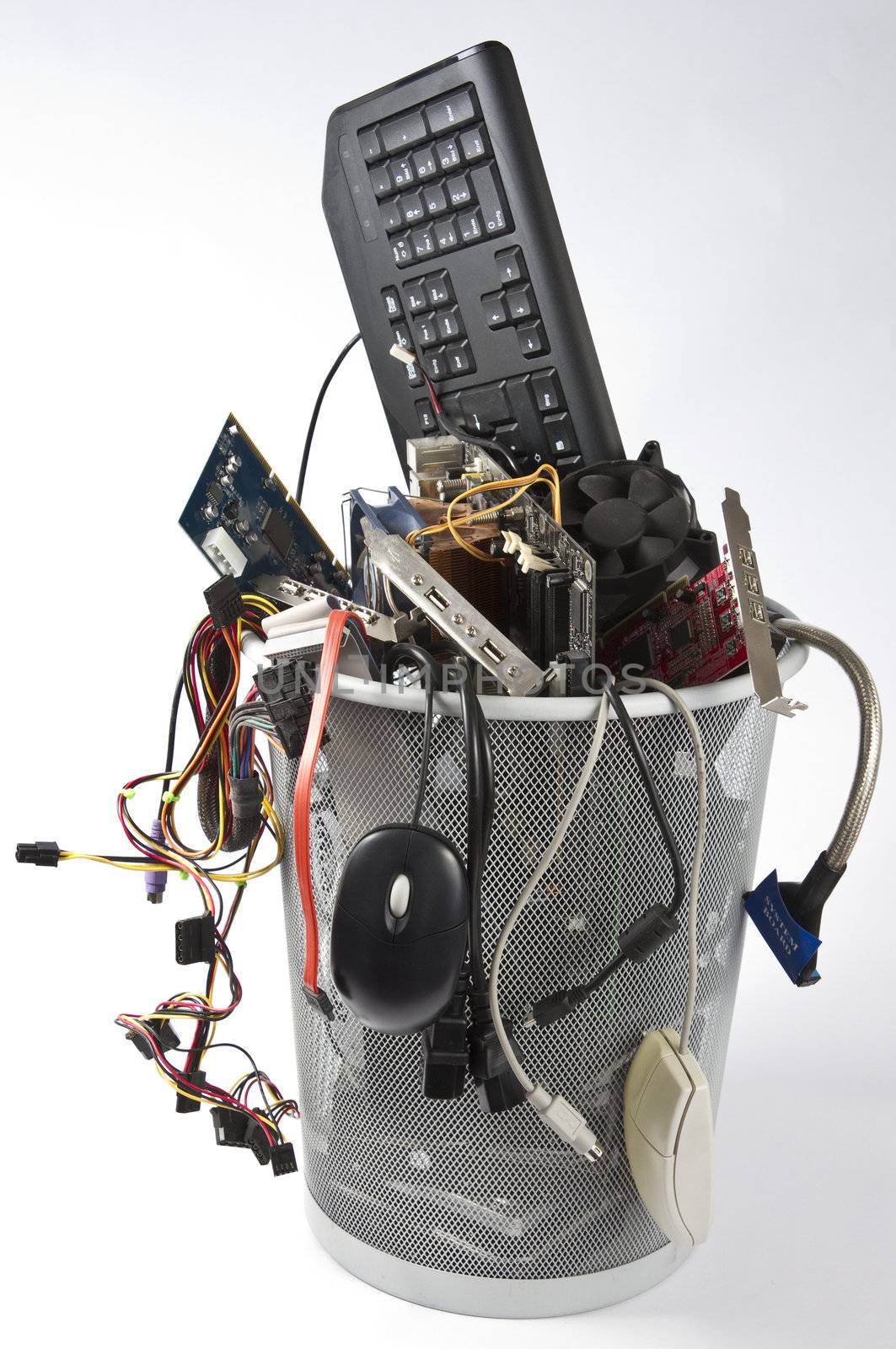 trashcan in grey background with many computer parts