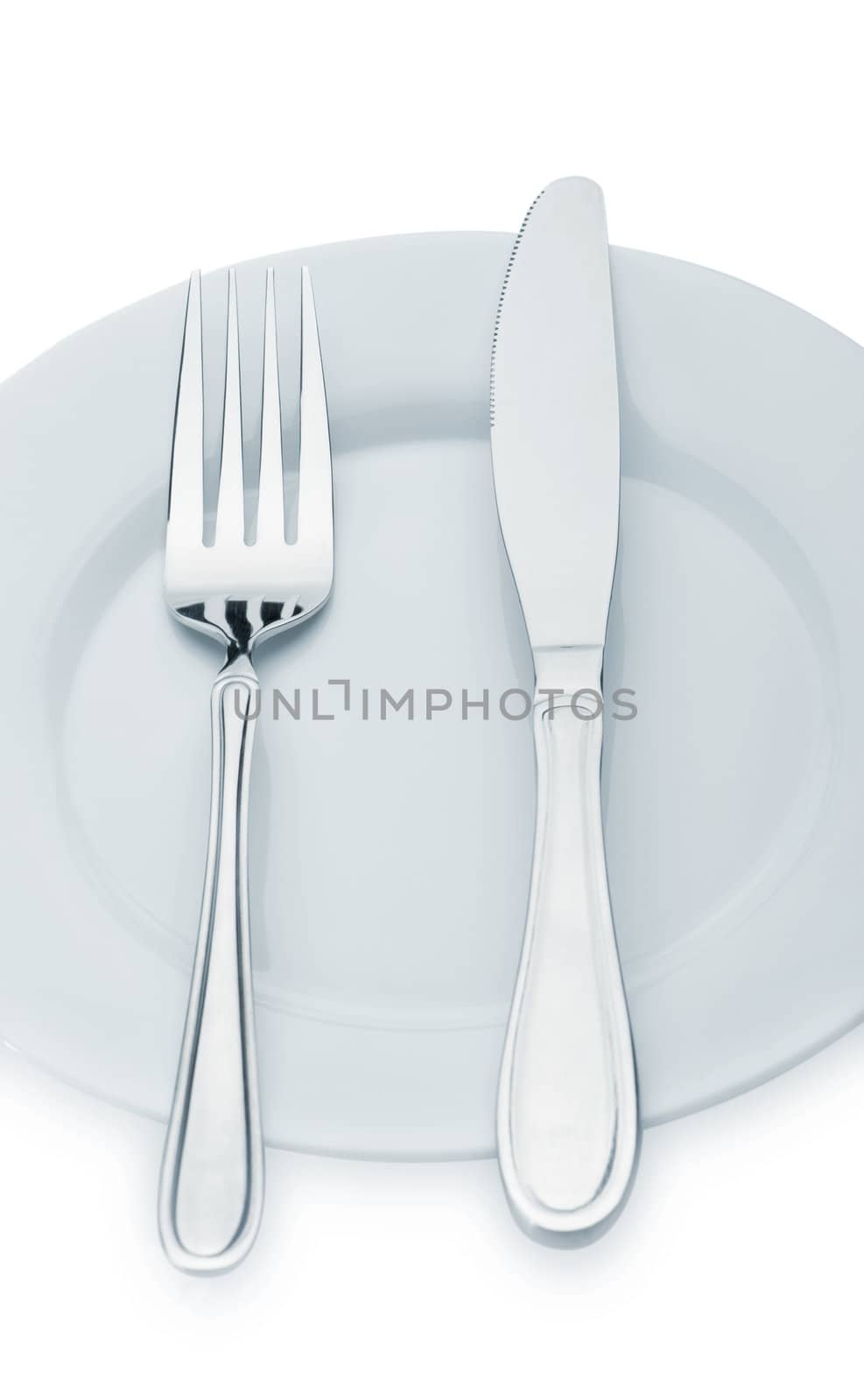 Knife and fork on a plate by galdzer