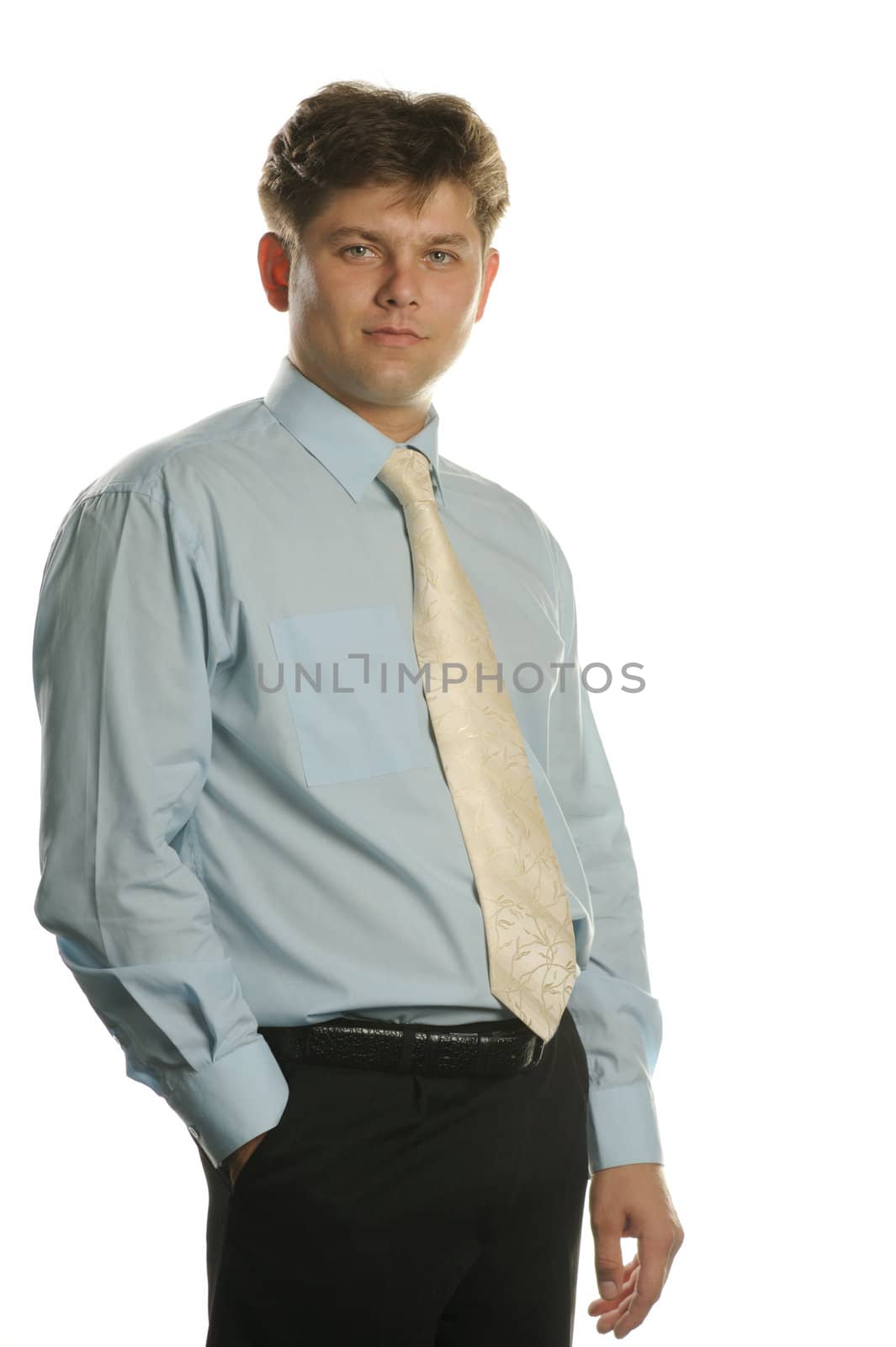 The young businessman isolated on a white background. A portrait of the man.