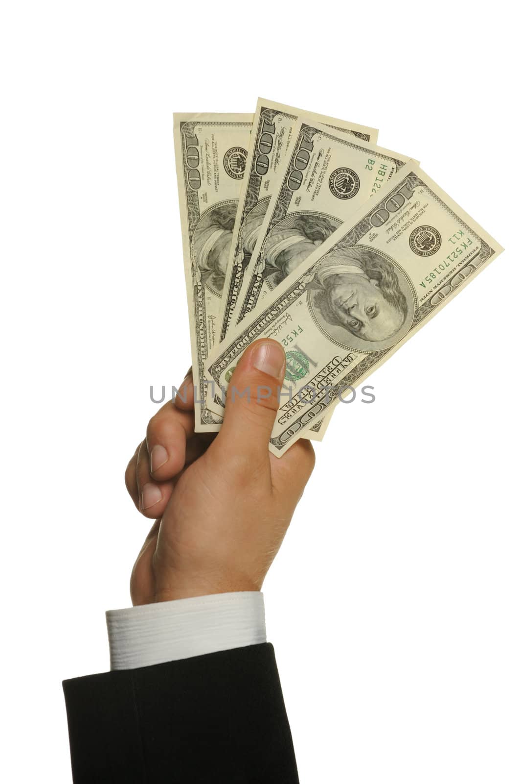 Dollars in a hand of the businessman. It is isolated on a white background