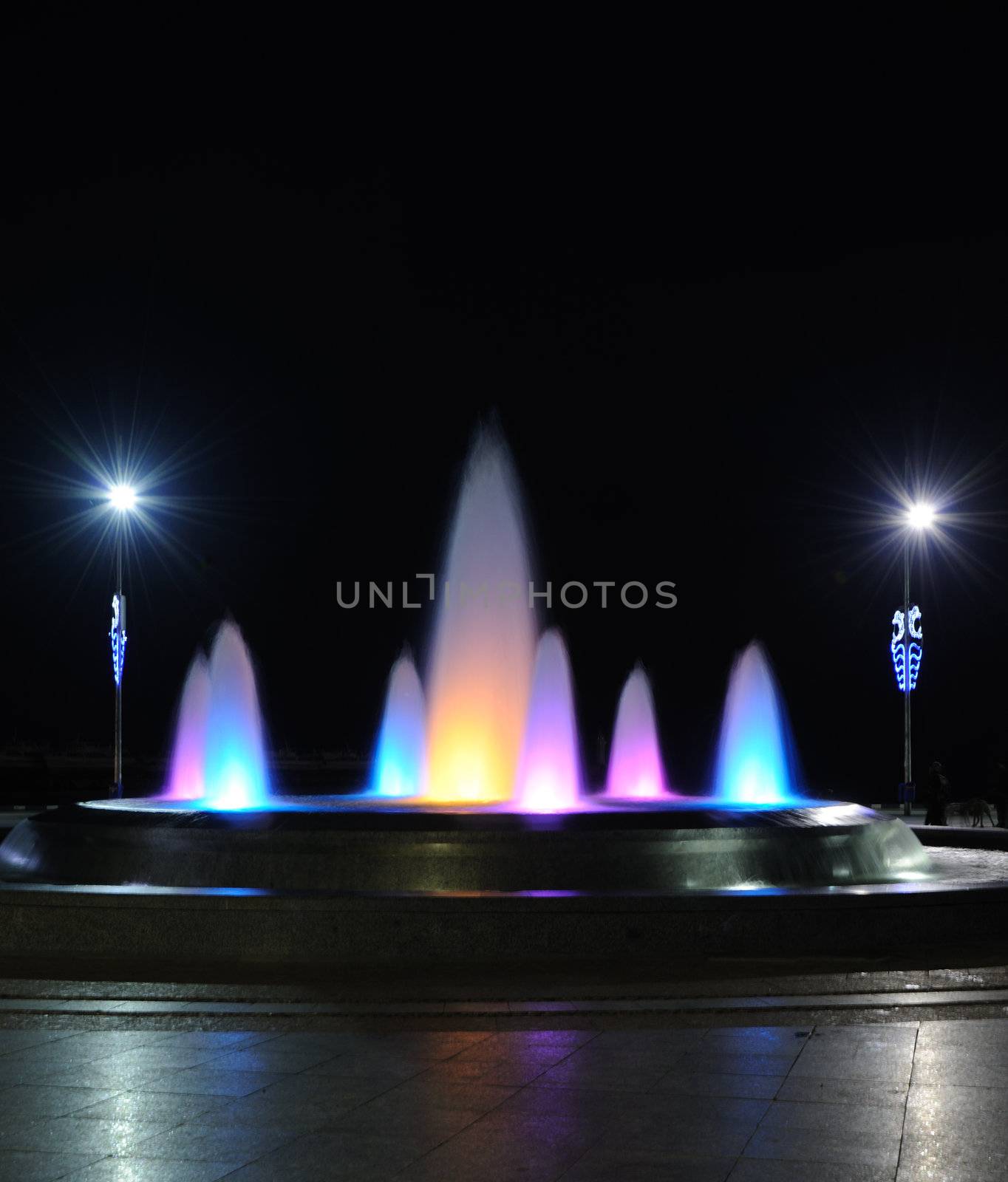 Color fountain. A night photo, light from street lanterns