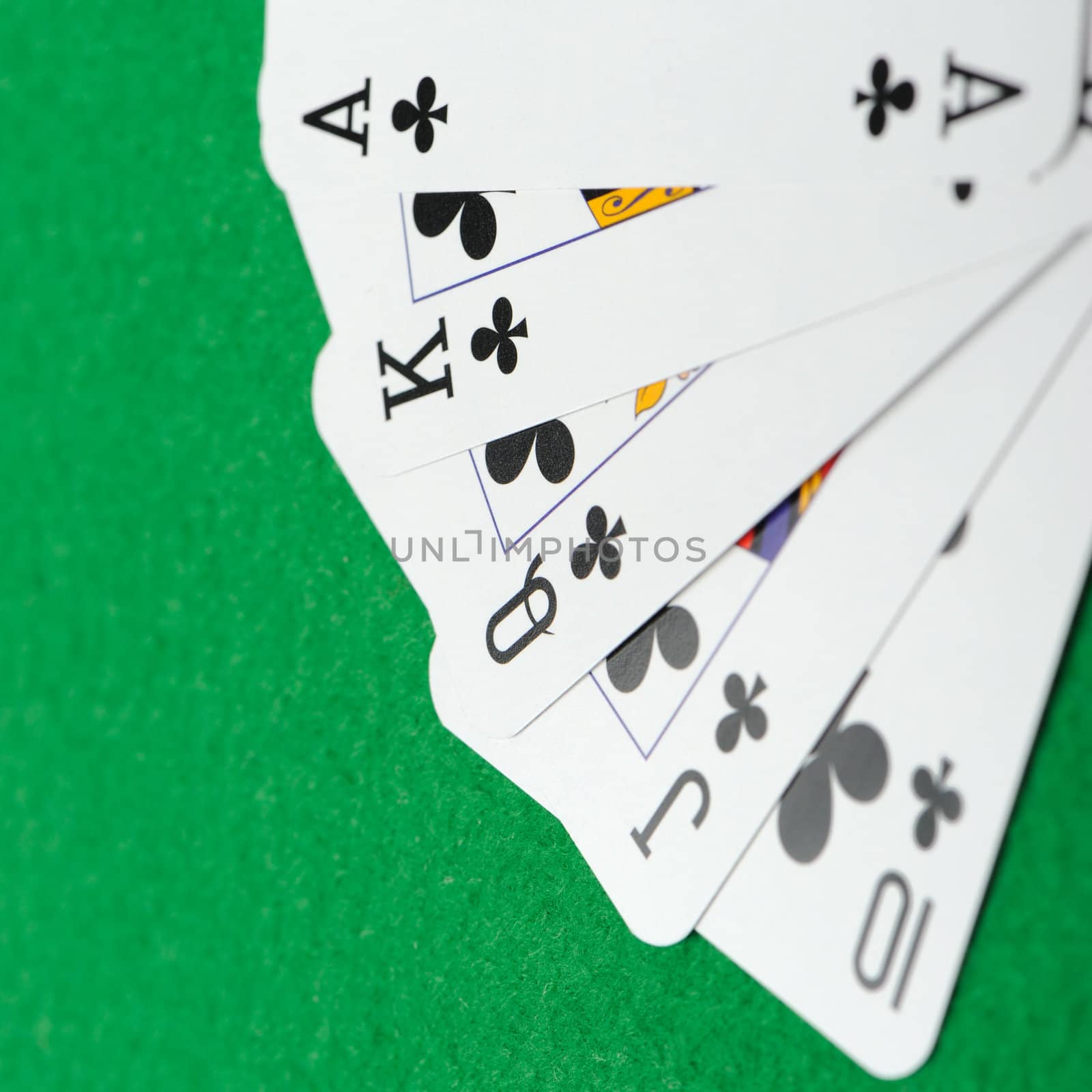 Playing cards on a green background. Poker cards
