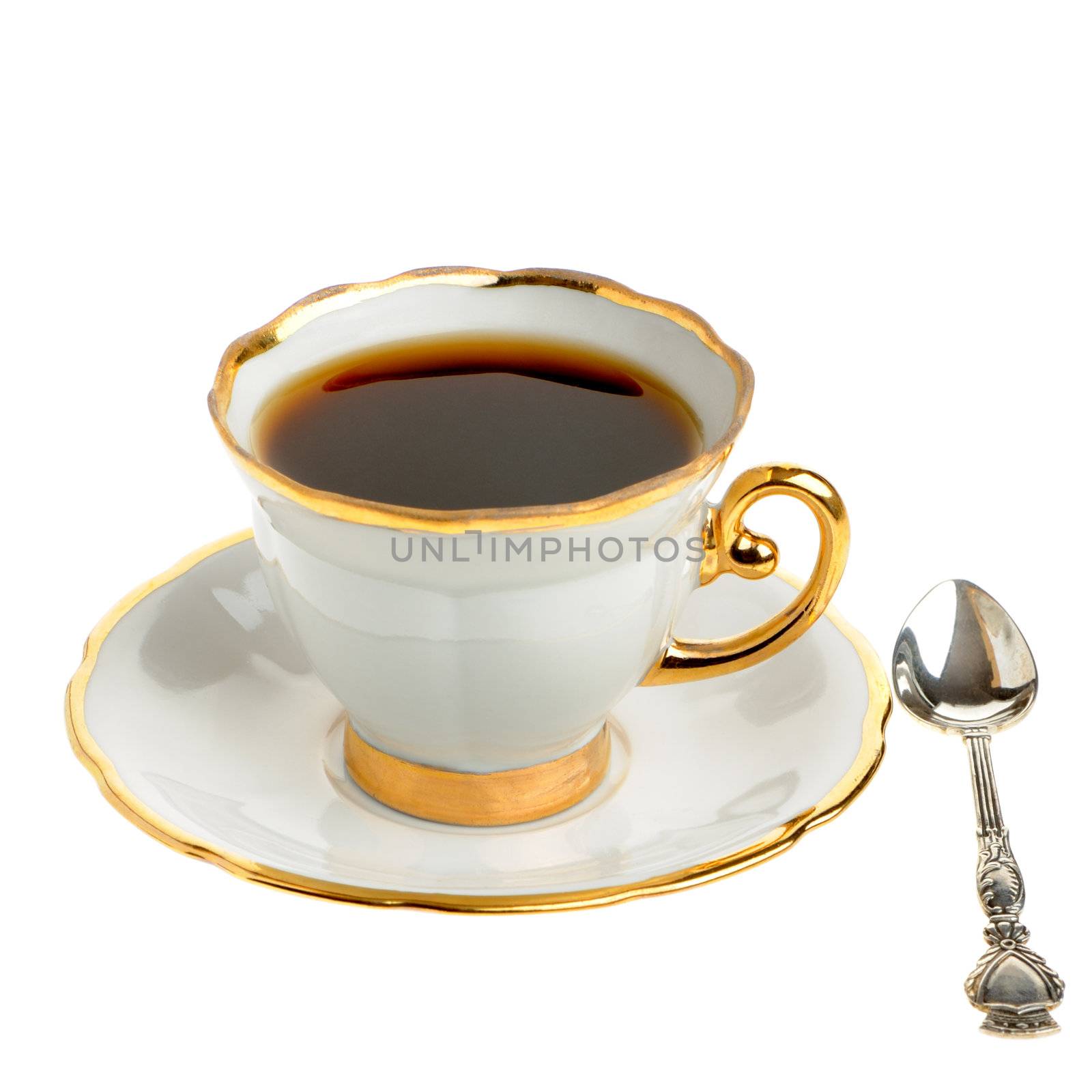 stylish coffee cup with silver spoon. A cup with a coffee drink. It is isolated on a white background