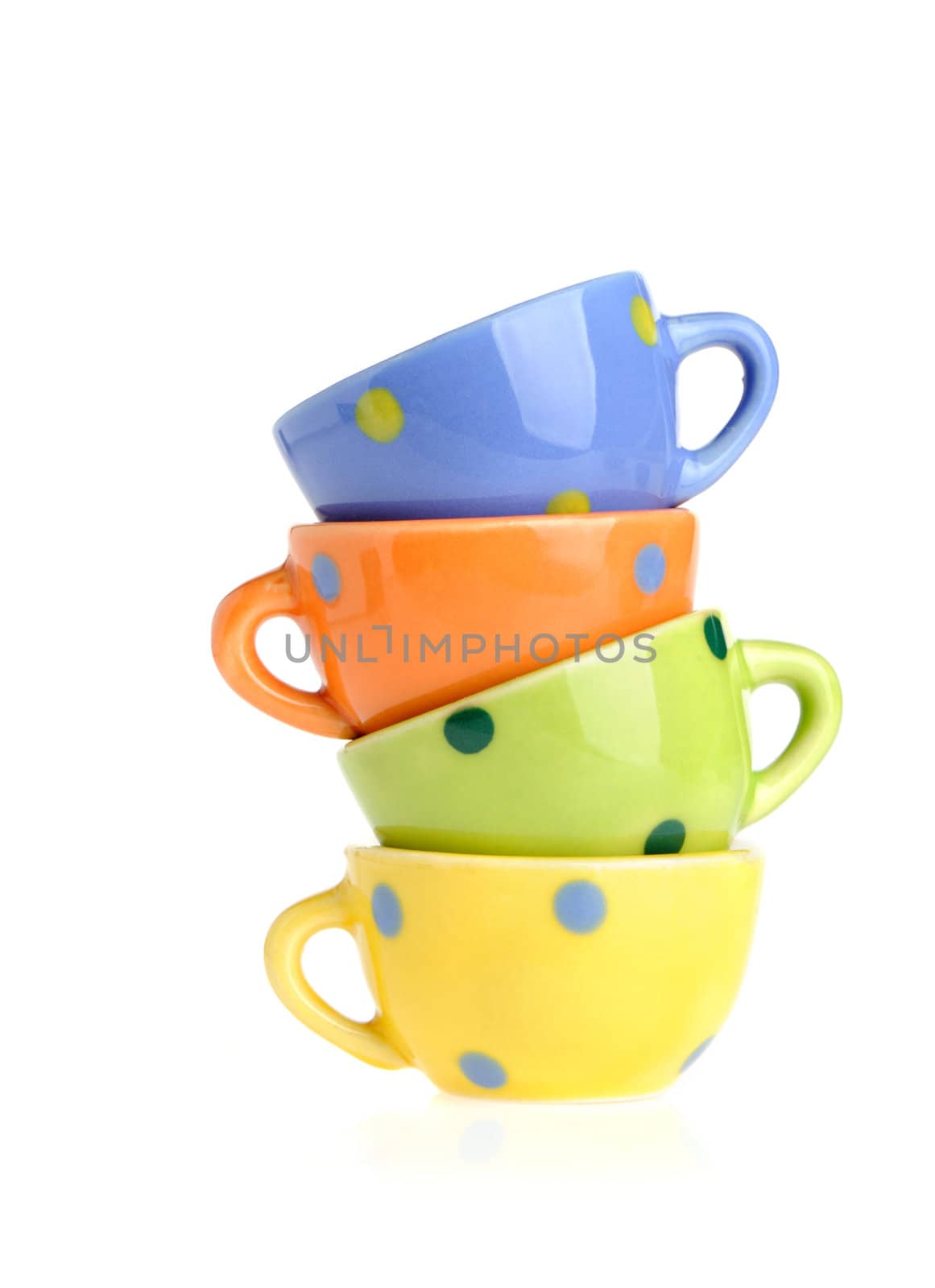 Color cups. Tiny utensils it is isolated on a white background