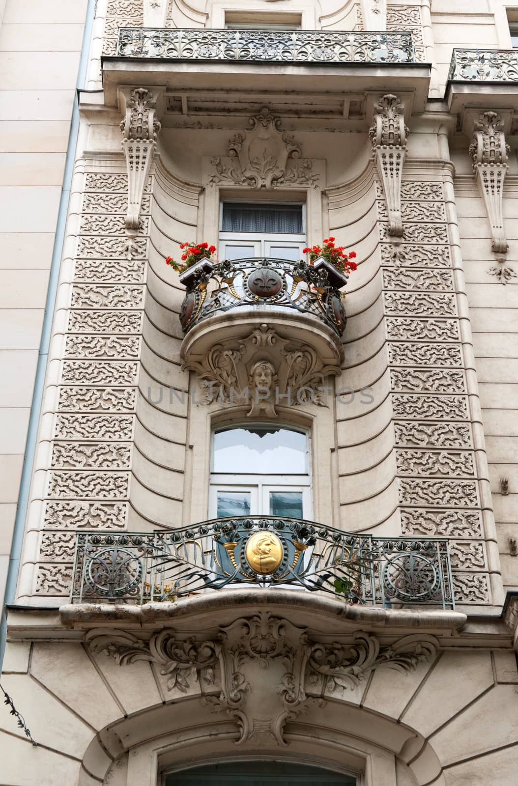 Balcony with decorated golden banisters in Prague