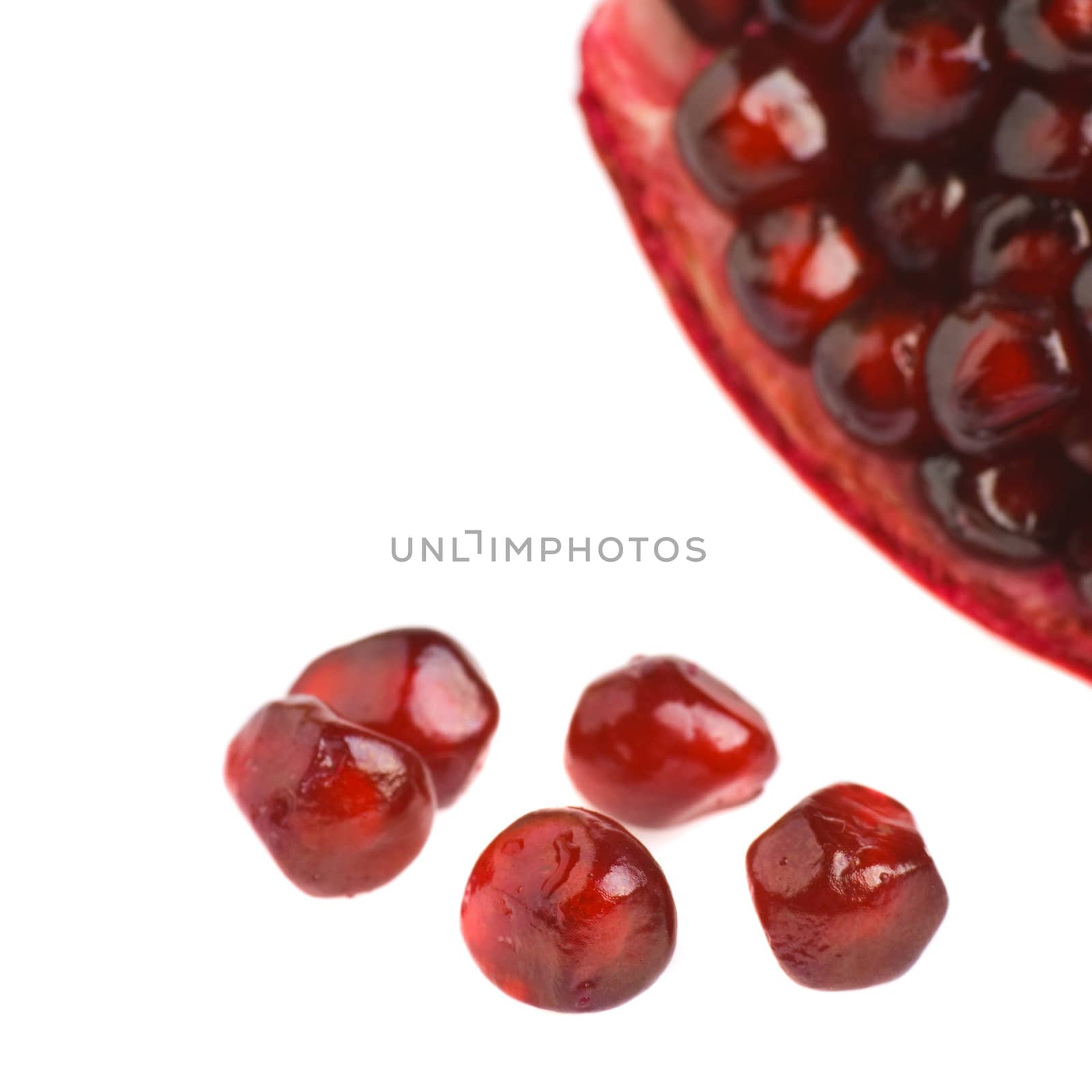 Pomegranate. Ripe fruit. It is isolated on a white background