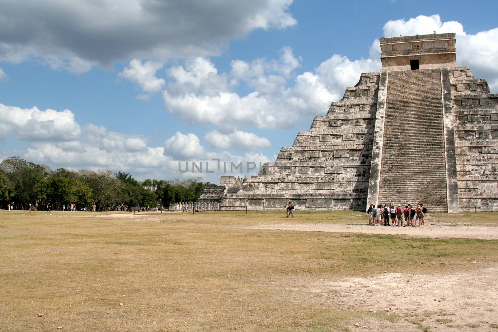 A crowd of tourists at Chichen Itza, (Mayan Ruins) in Mexico.