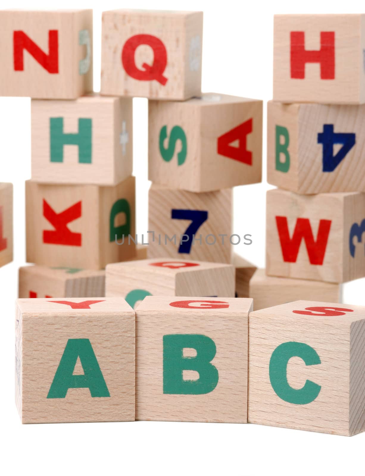 The alphabet. Letters drawn on wooden cubes. A children's toy