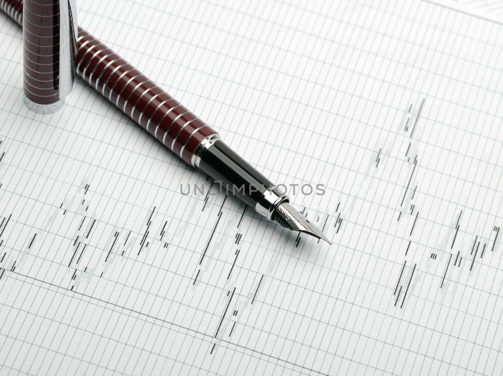 Business a theme. Diagrams from the share market, pens. Concept - exchange activity