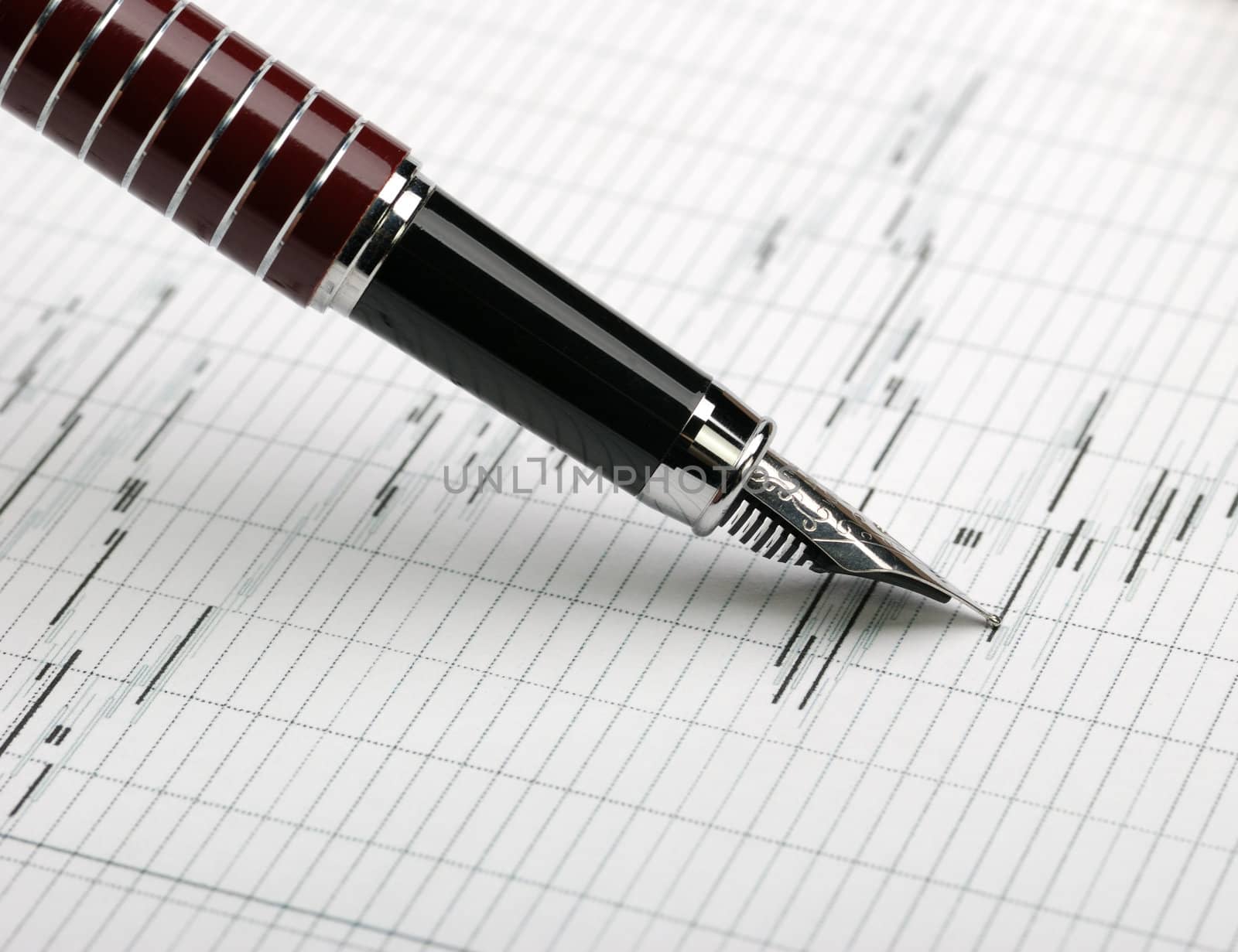 Business a theme. Diagrams from the share market, pens. Concept - exchange activity