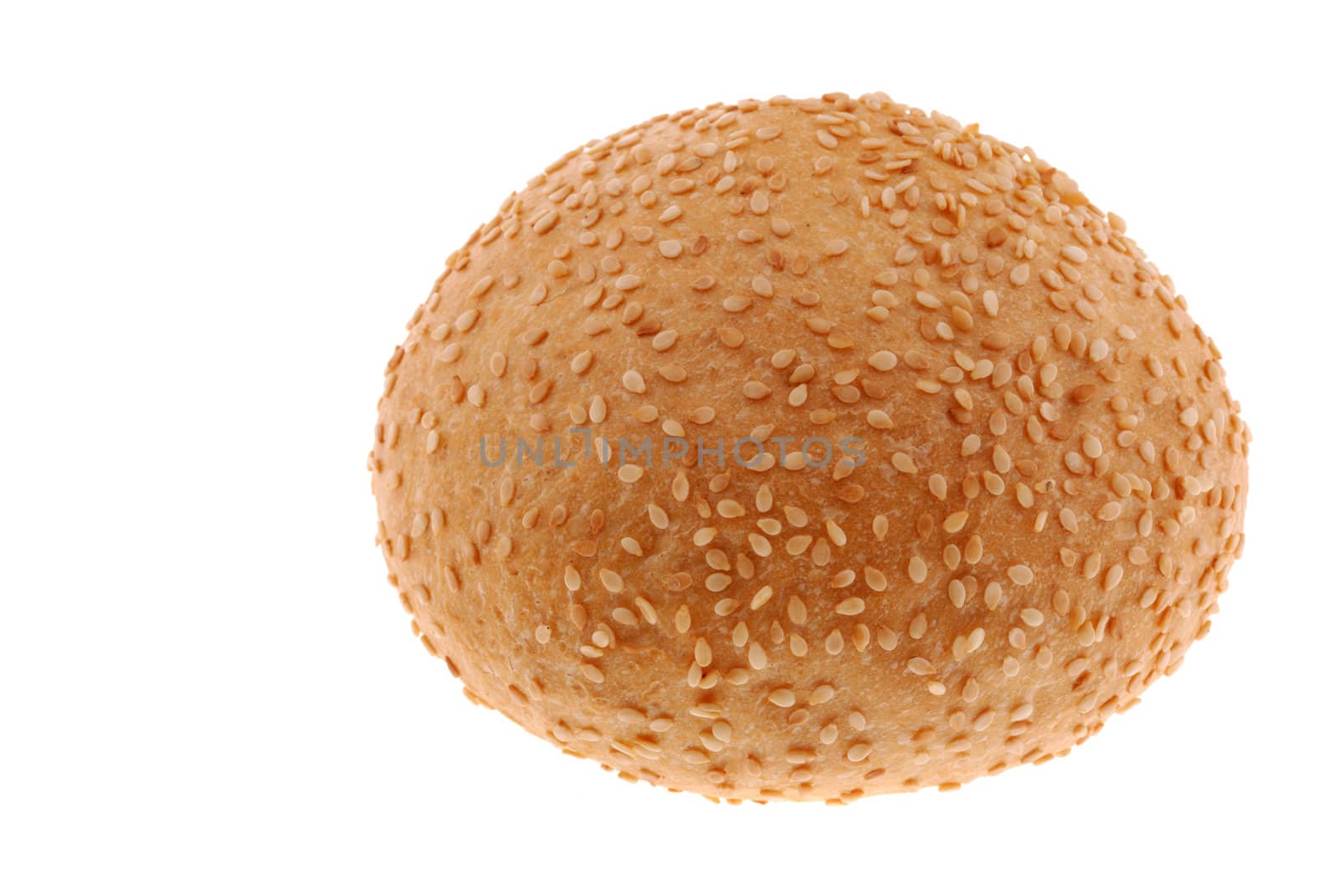 bun for sandwich. A bakery product strewed by grains