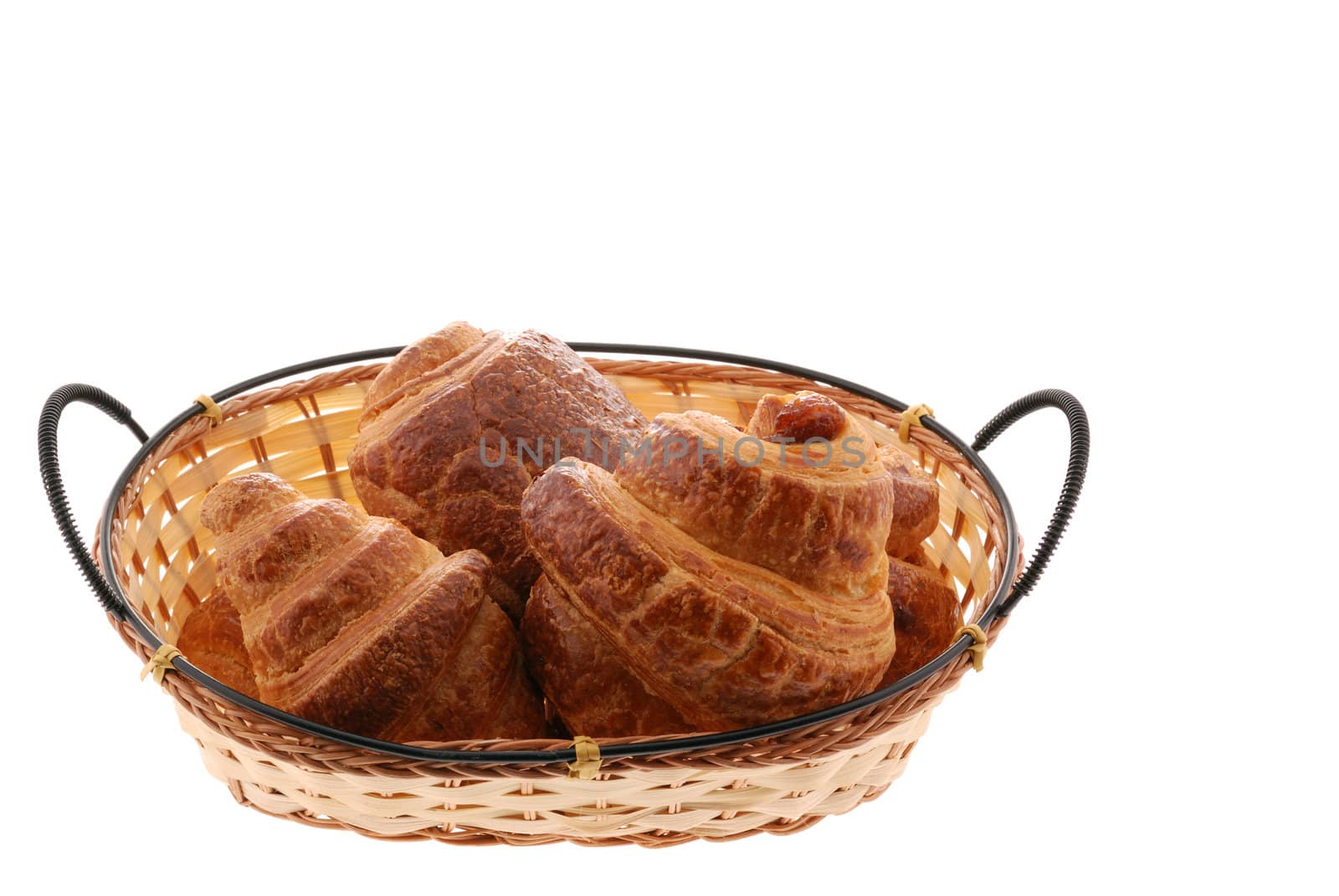 Croissant in basket by galdzer
