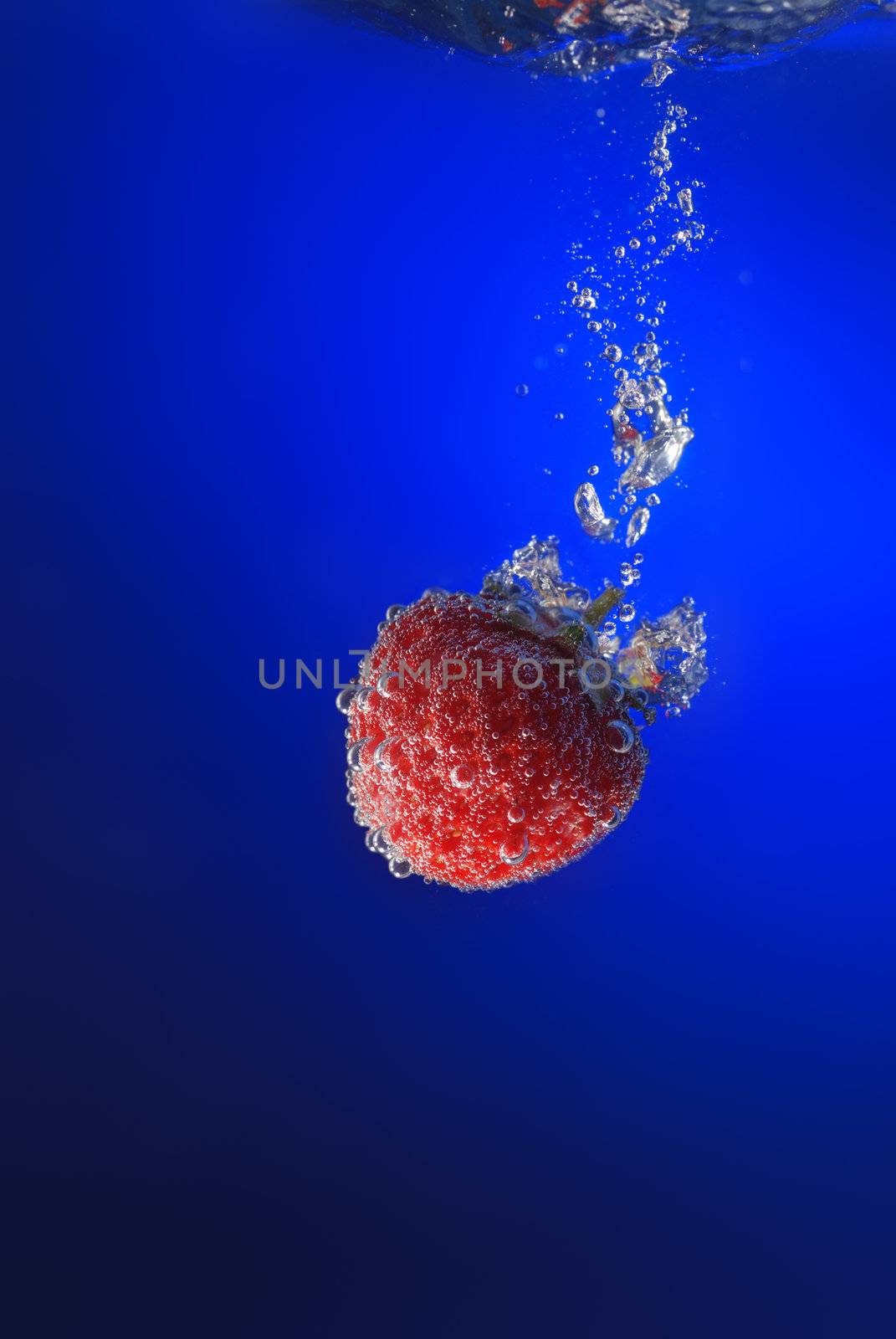 Strawberry in water by galdzer