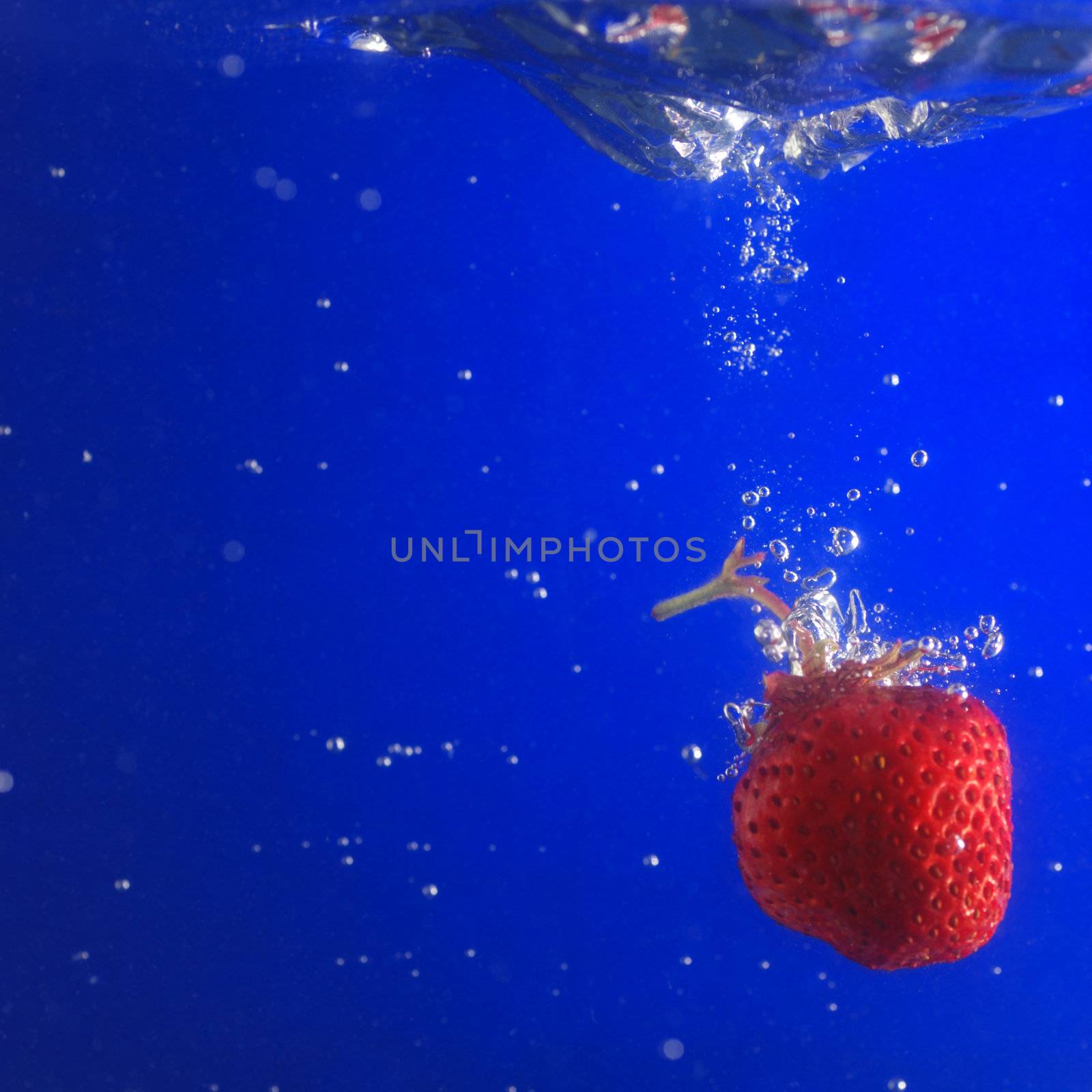 Strawberry in water by galdzer