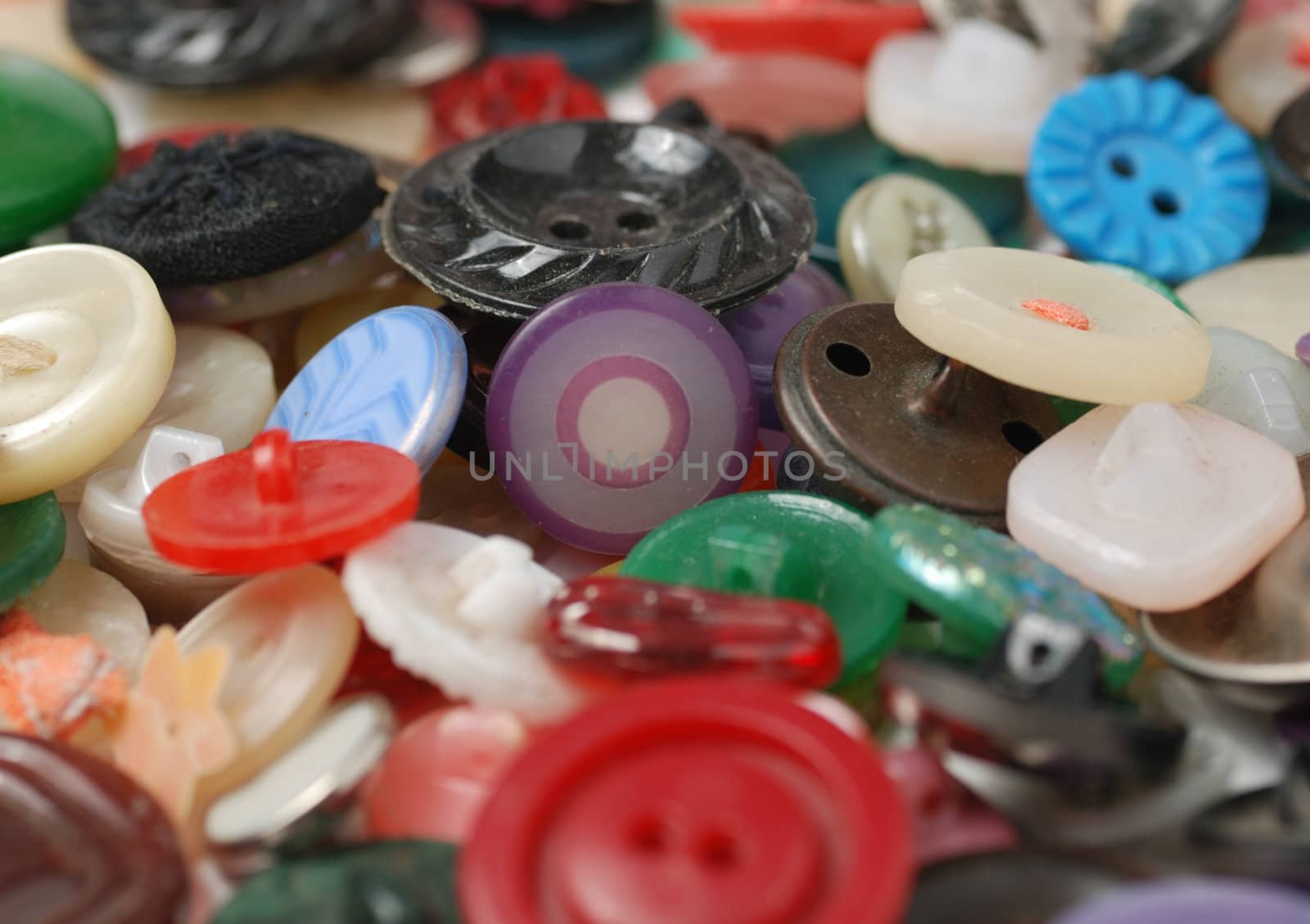 Buttons. A set of color buttons for clothes from a various material