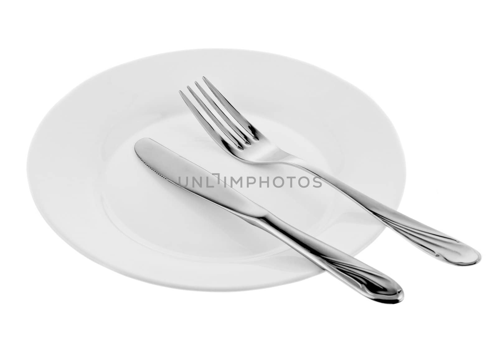 Set of kitchen object. The fork, a knife, a plate. Separately on a white background.