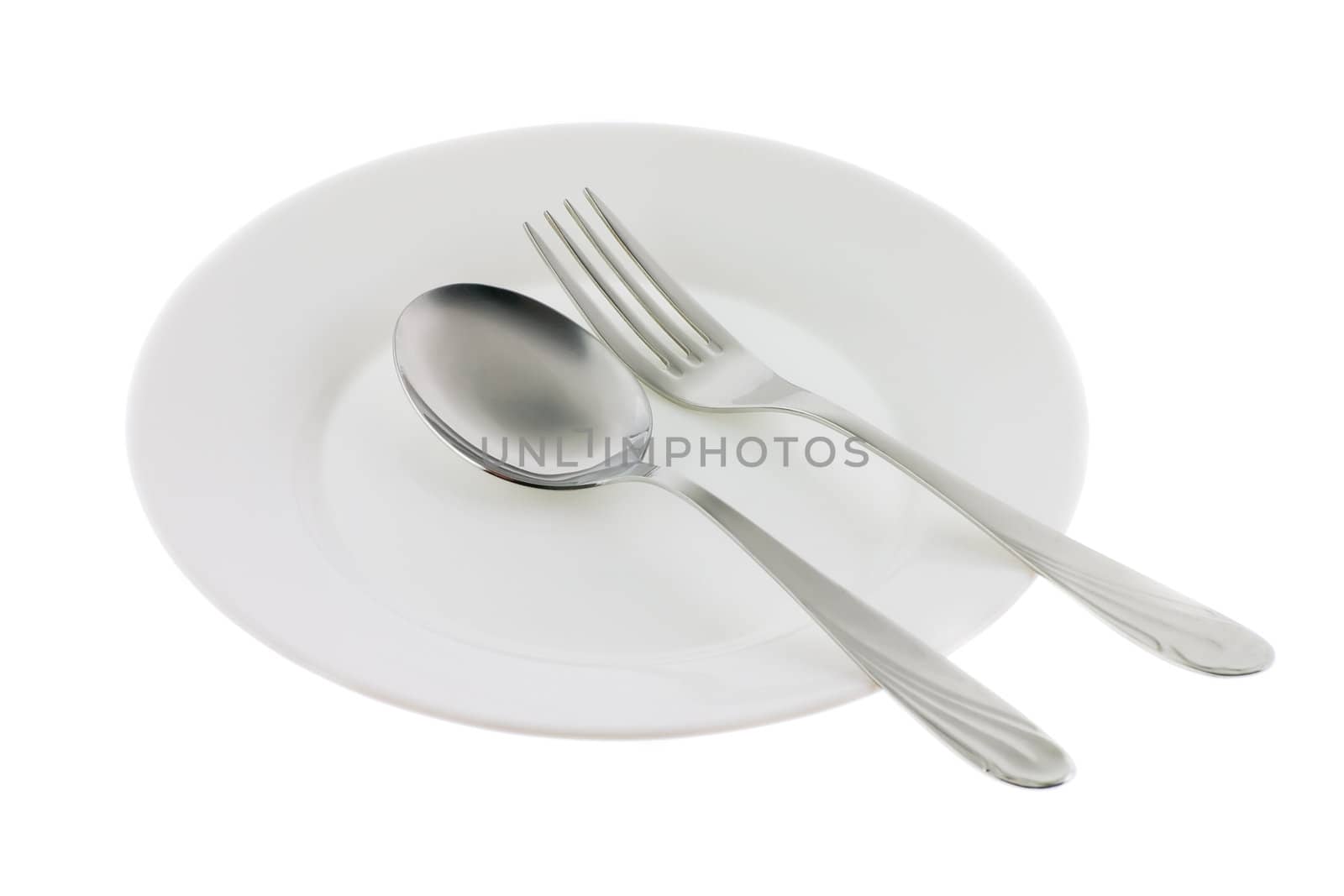 Set of kitchen object. The spoon, a fork, a plate. Separately on a white background.