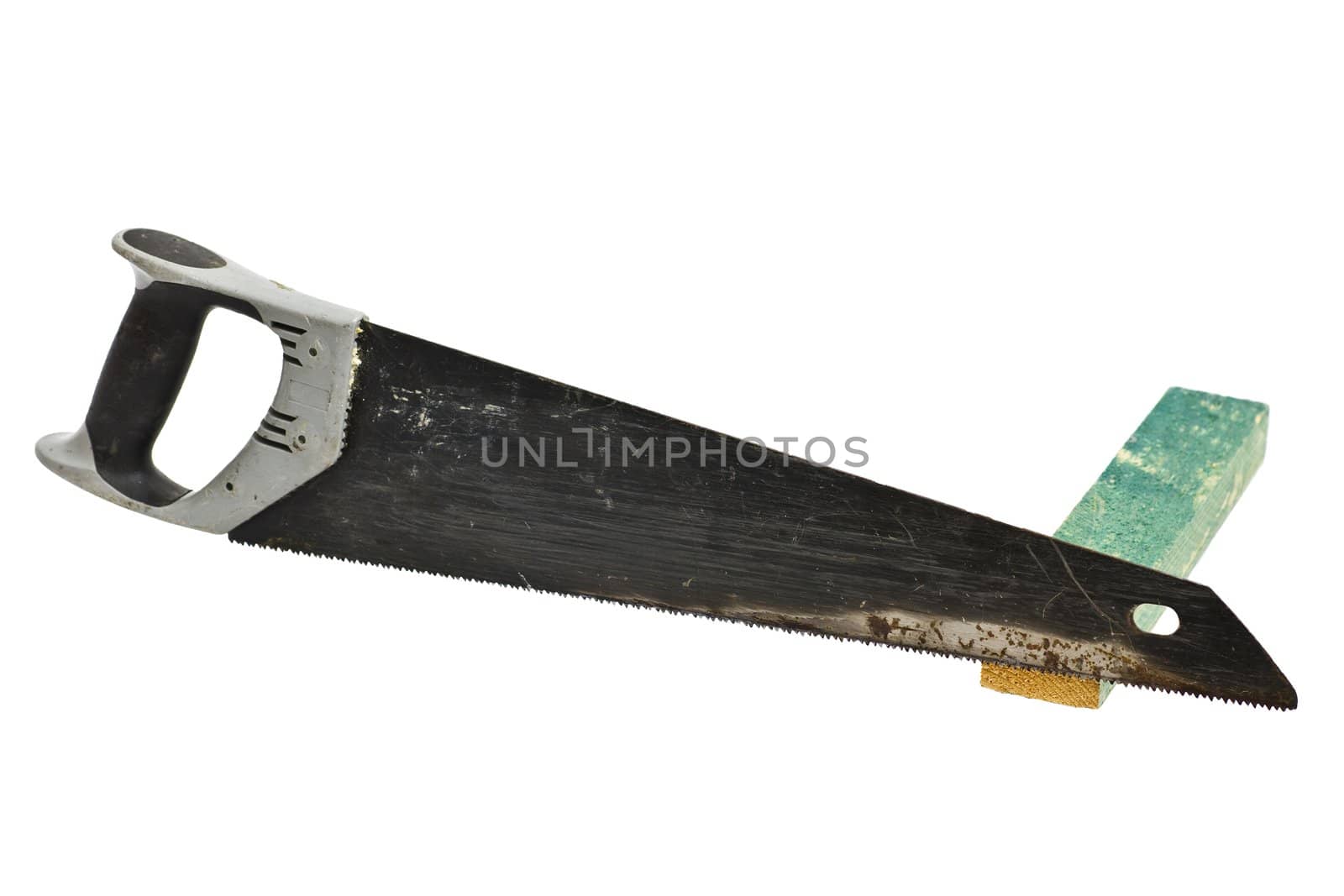 used hand saw with wood on white background. The saw has a grey plastic handle