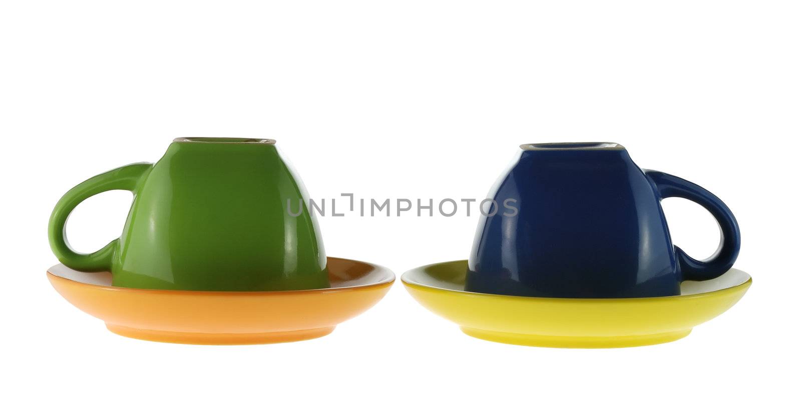 Color cups. Ceramic service from color cups
