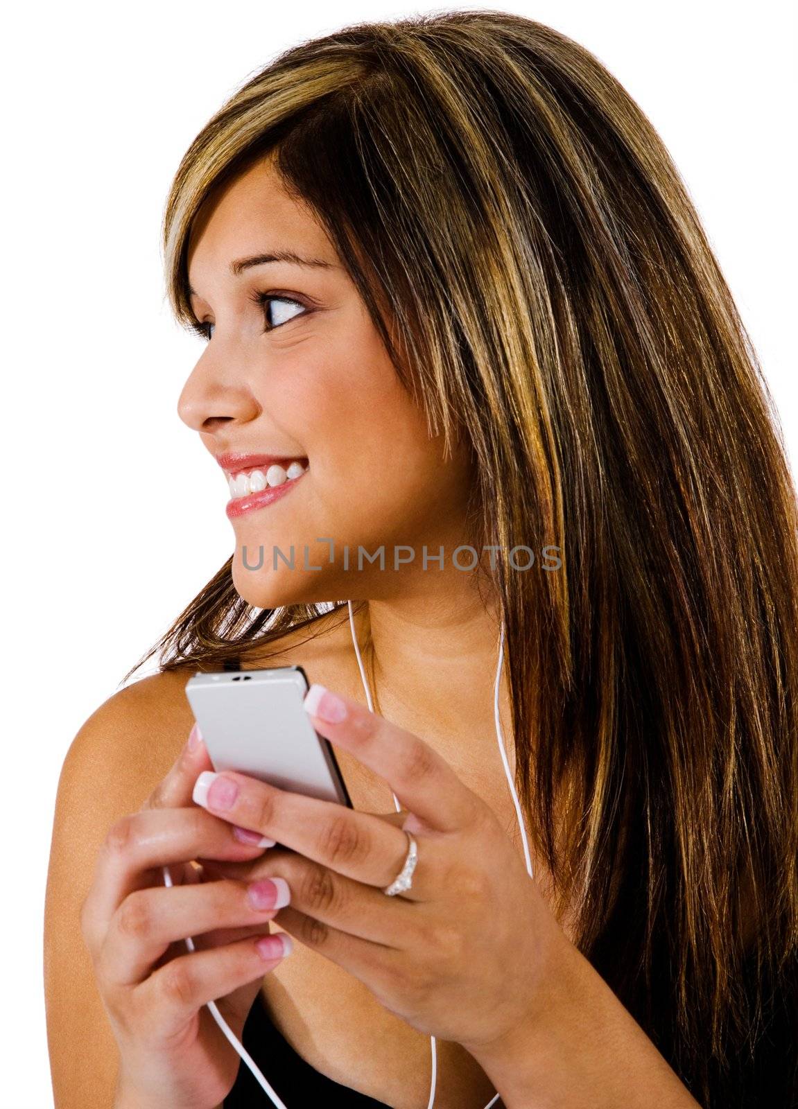 Happy woman listening to music on MP3 player isolated over white