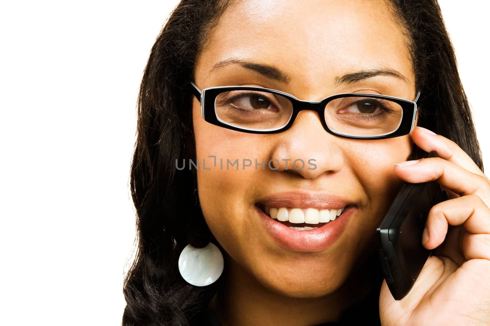Hispanic woman talking on a mobile phone isolated over white