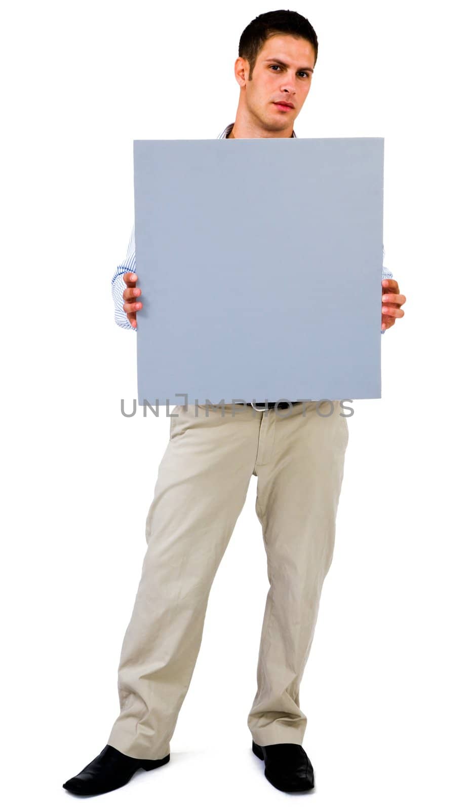 Young man showing an empty placard isolated over white