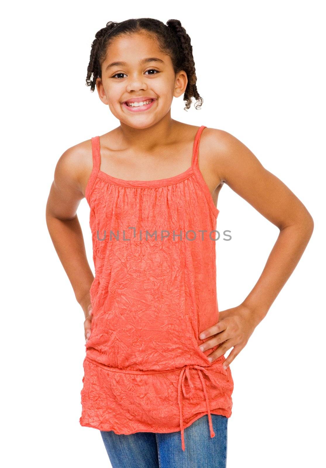 Child standing and smiling isolated over white
