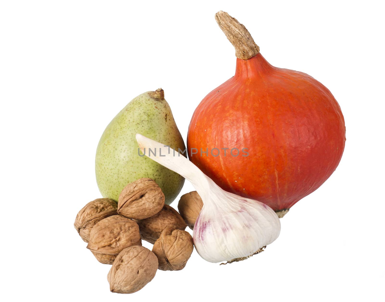 pear, pumpkin, garlic and many nuts isolated on white background