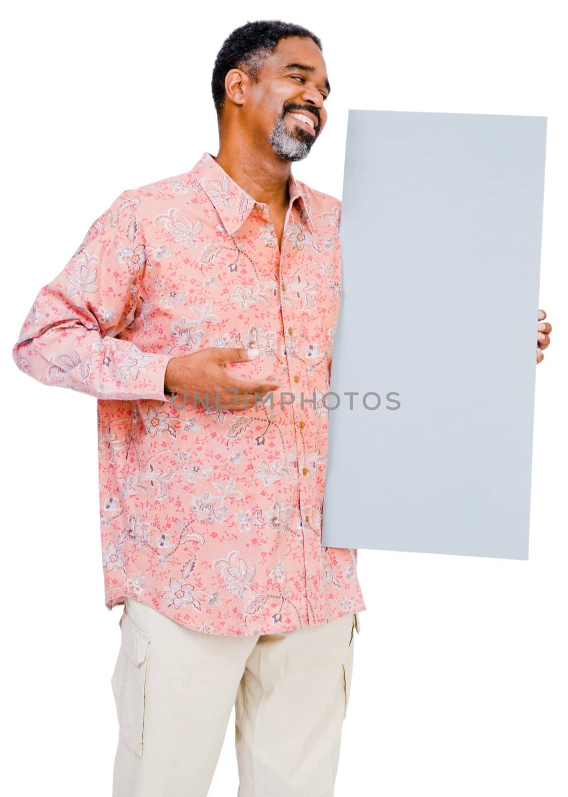 Mature man showing a placard and smiling isolated over white