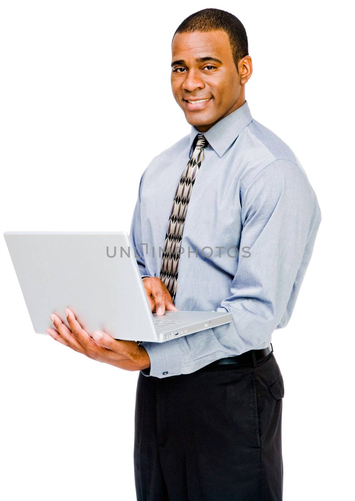 Happy businessman using a laptop  by jackmicro