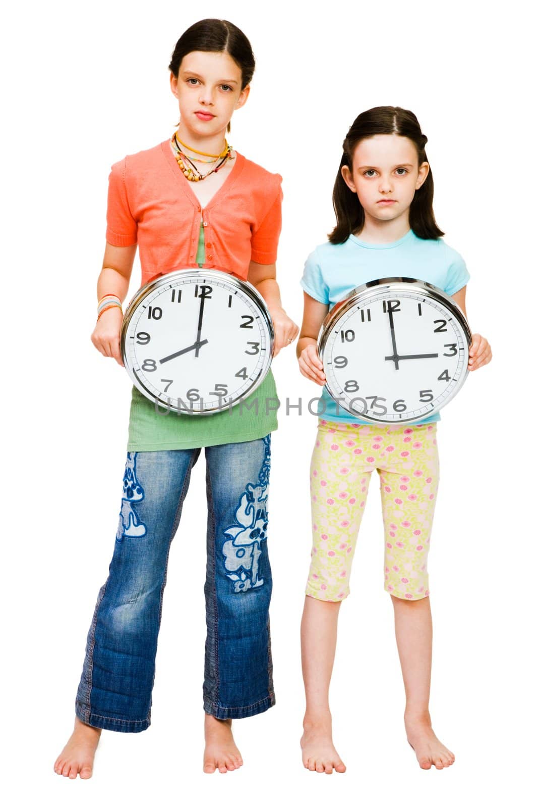 Two girls holding clocks  by jackmicro