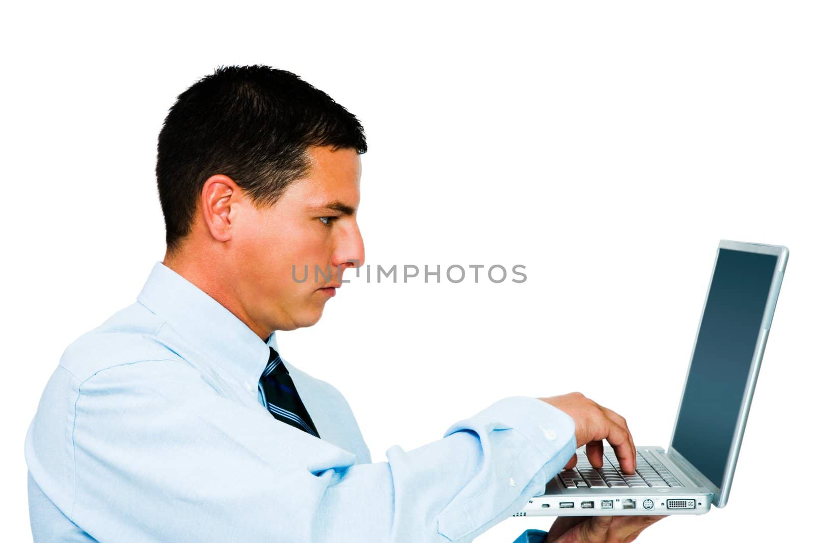 Close-up of a businessman using a laptop isolated over white