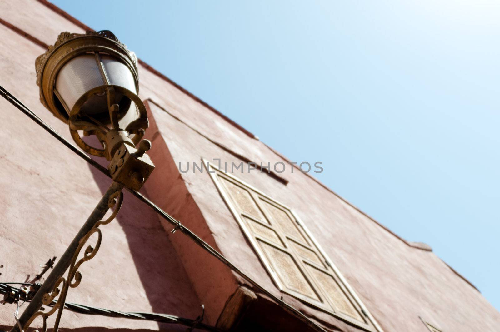 Nicely decorated old street lamp in the Medina of Marrakech, Morocco